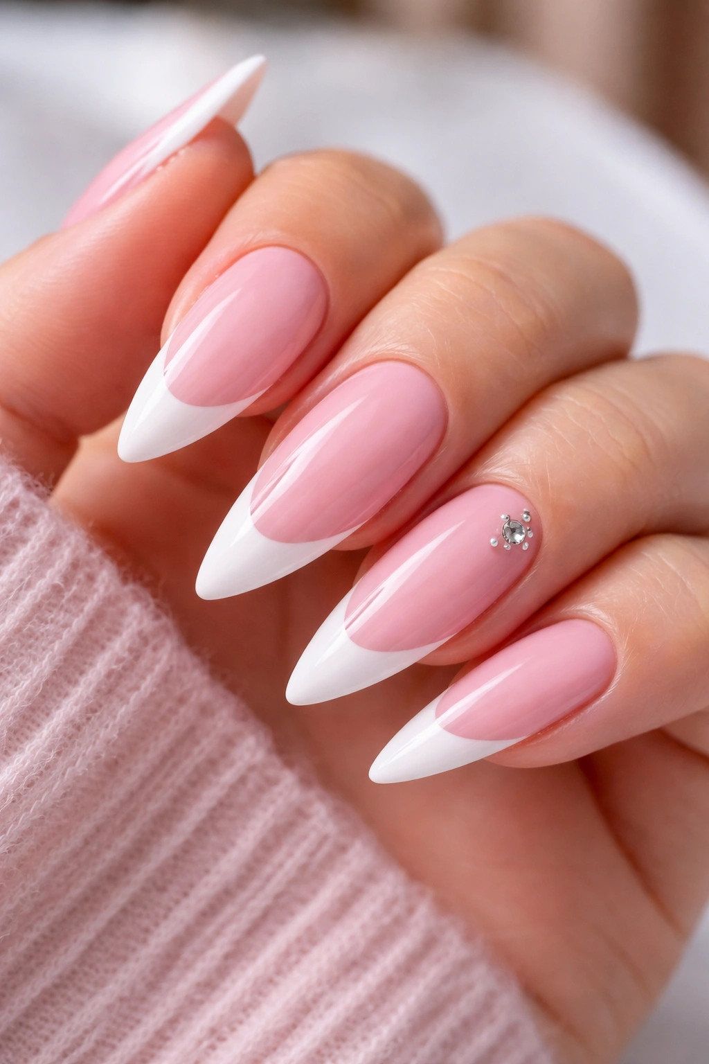 Pink nails layered with French tip and small accent detail