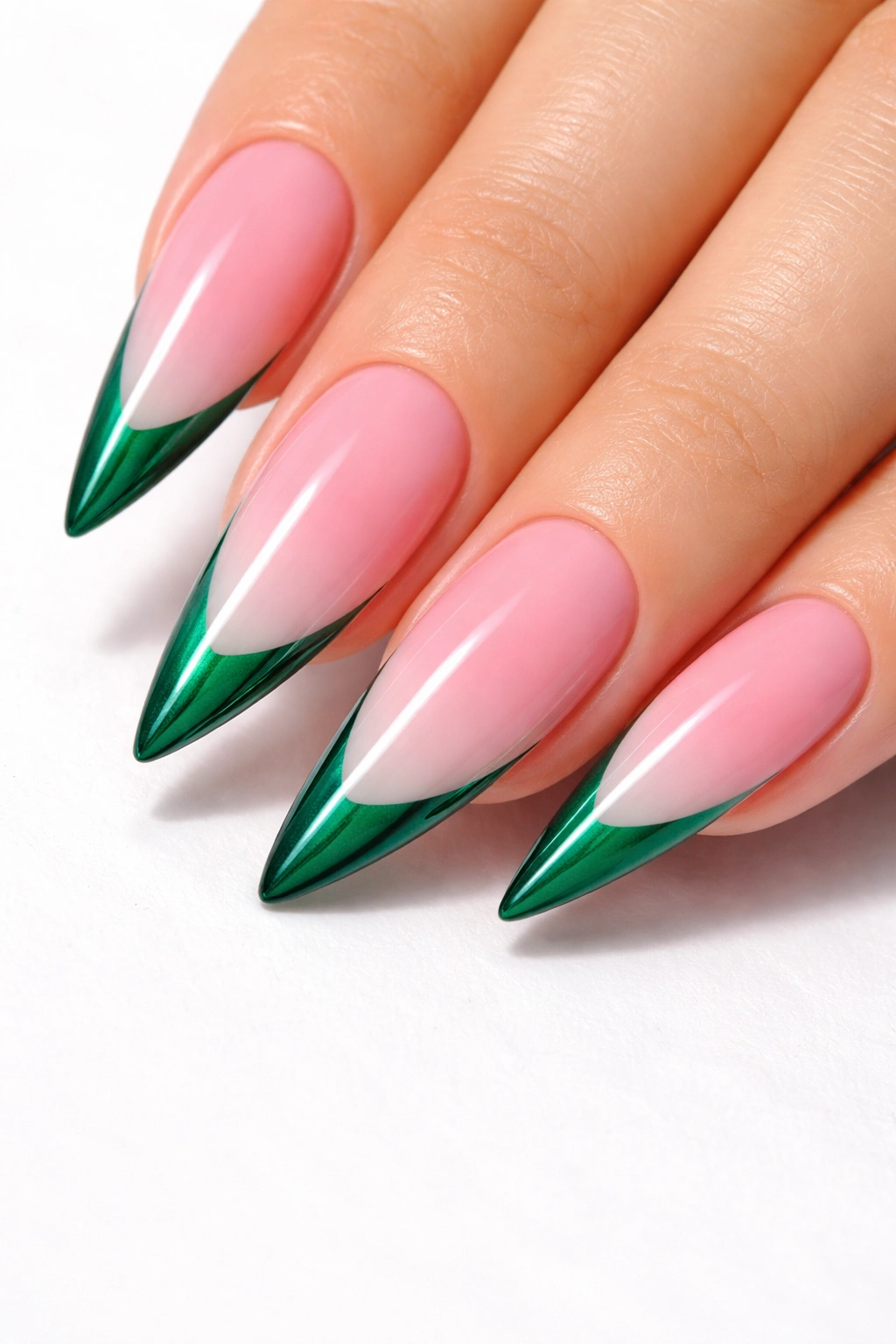 Close-up of pink ombre stilettos with emerald green tips