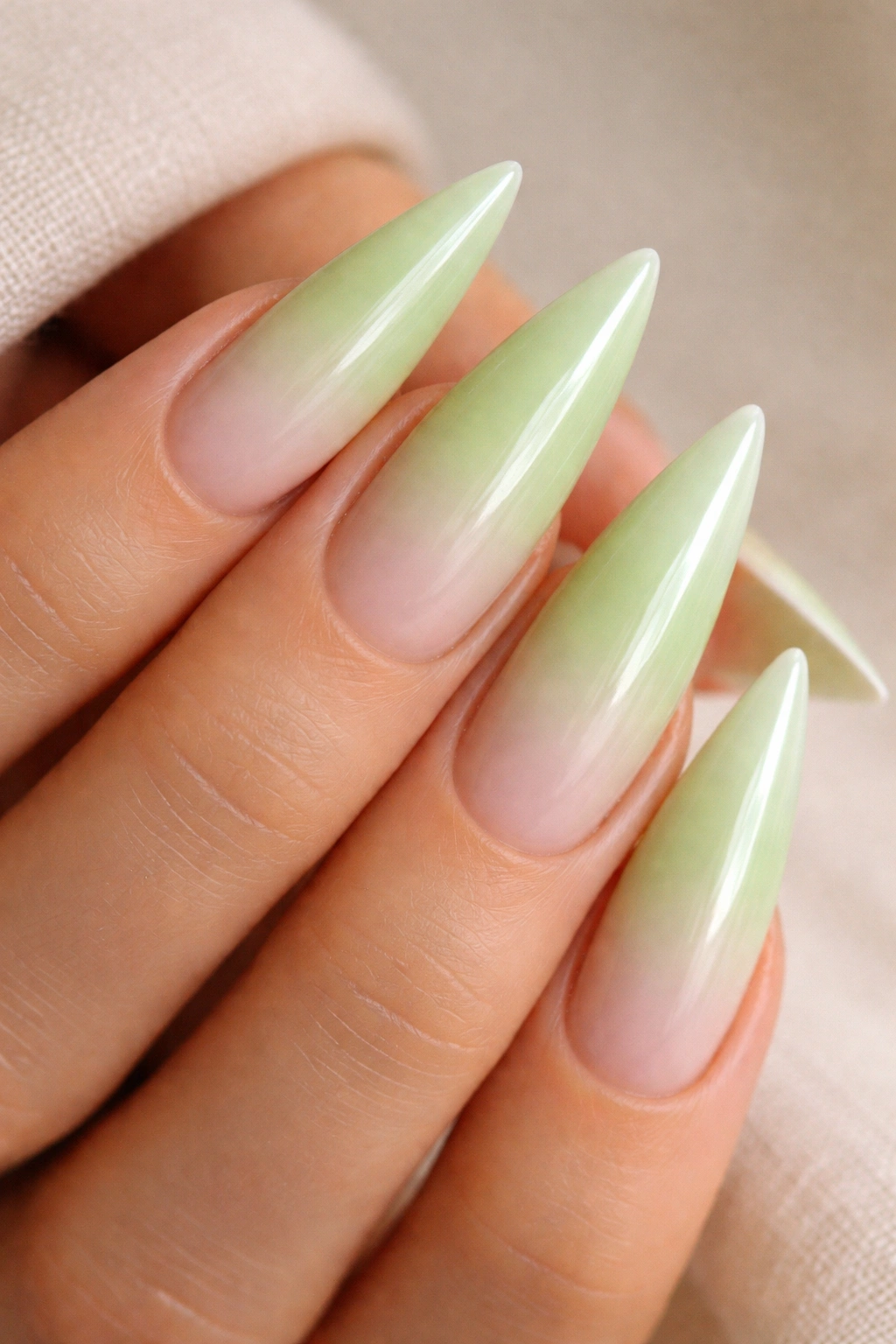 Pistachio to white ombre stiletto nail