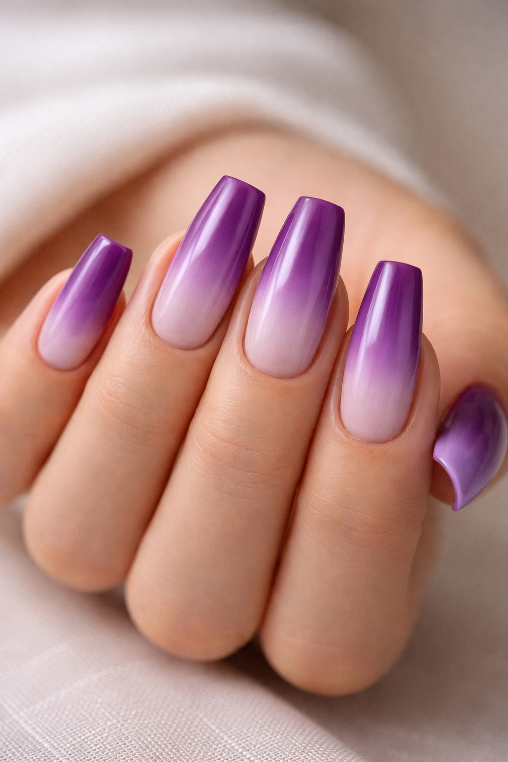 Medium coffin nails with purple plum to lavender ombre gradient