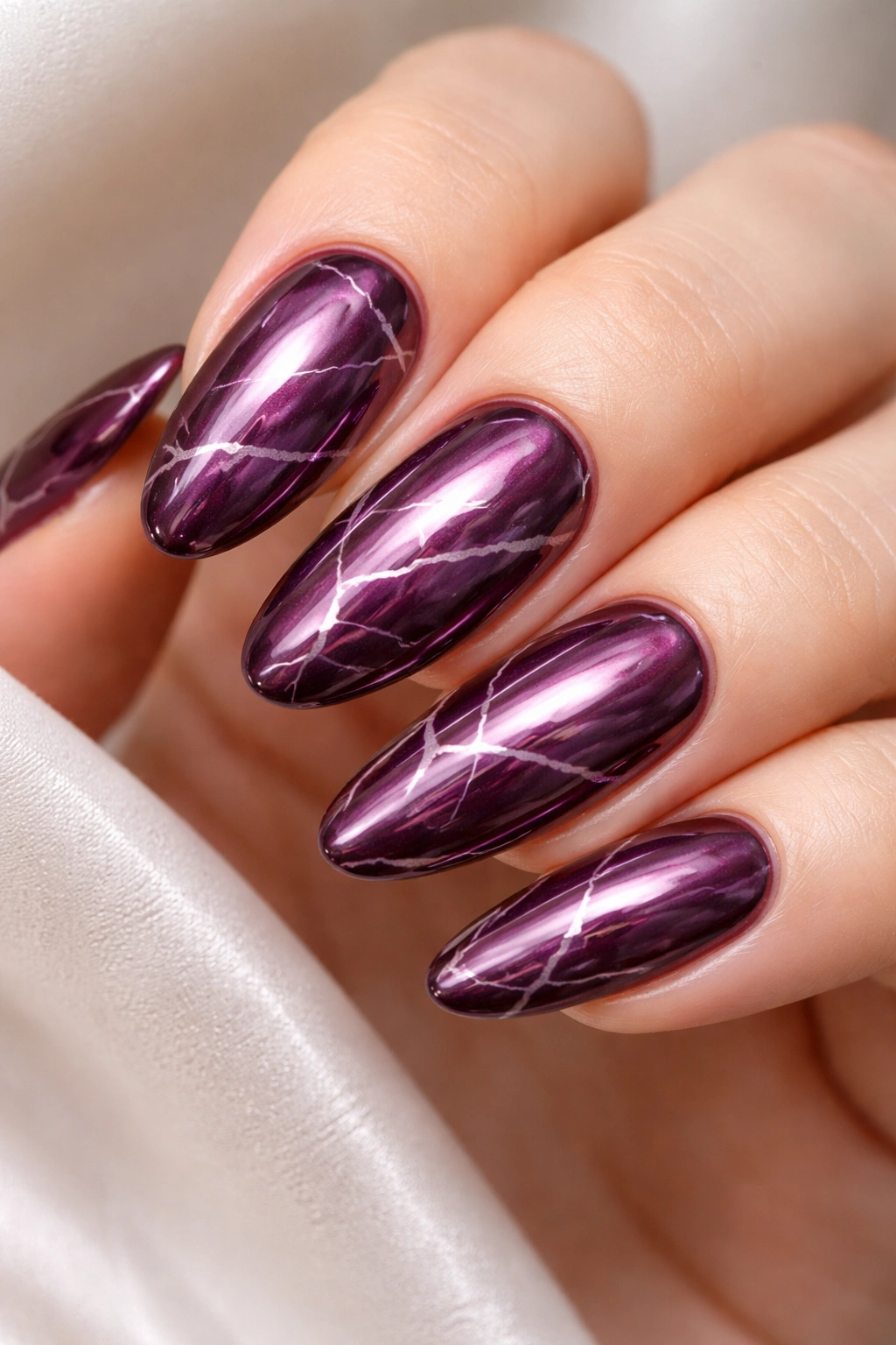 Glazed Plum Marble nails with white veins and chrome gloss