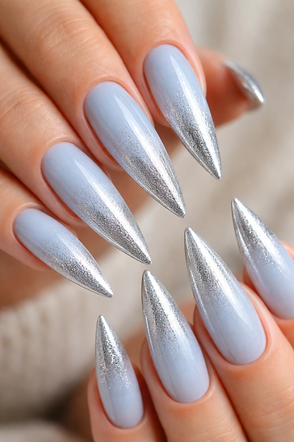 Powder blue to silver ombre on stiletto nails