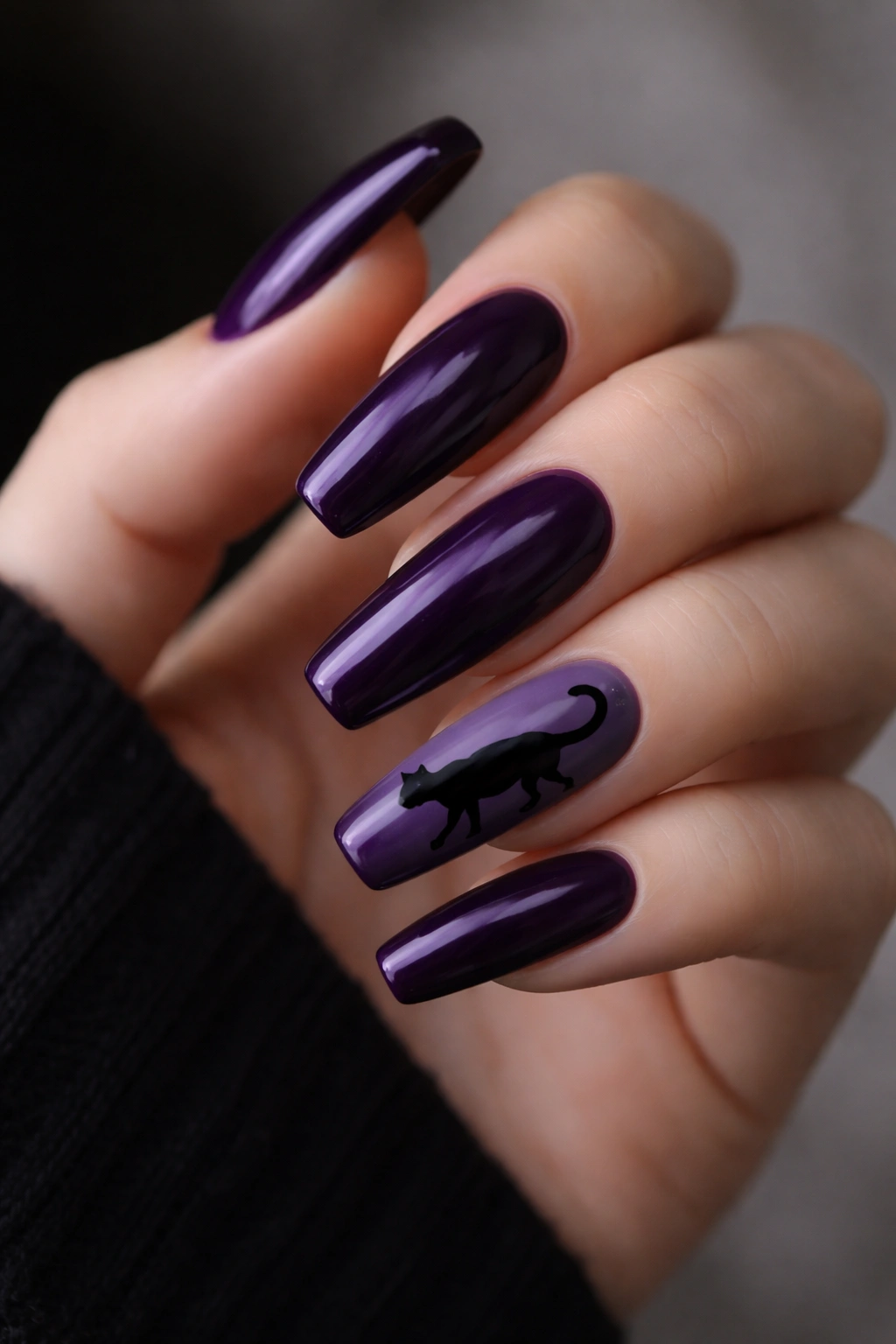 Deep purple coffin nails with a solid black cat silhouette