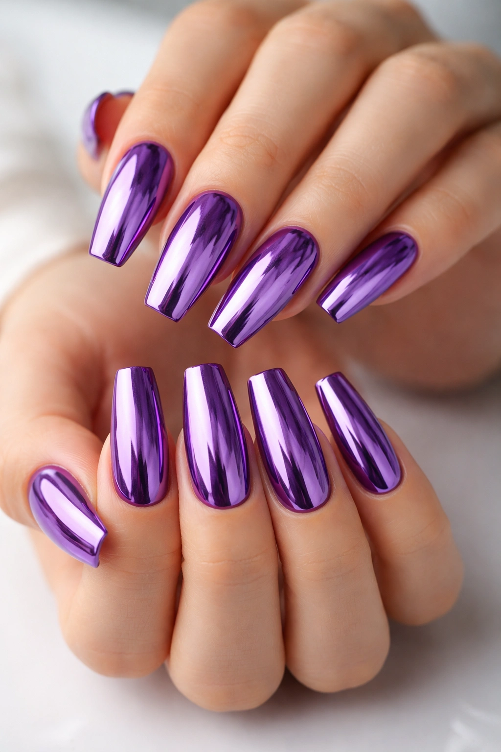 Purple chrome coffin nails with mirror finish