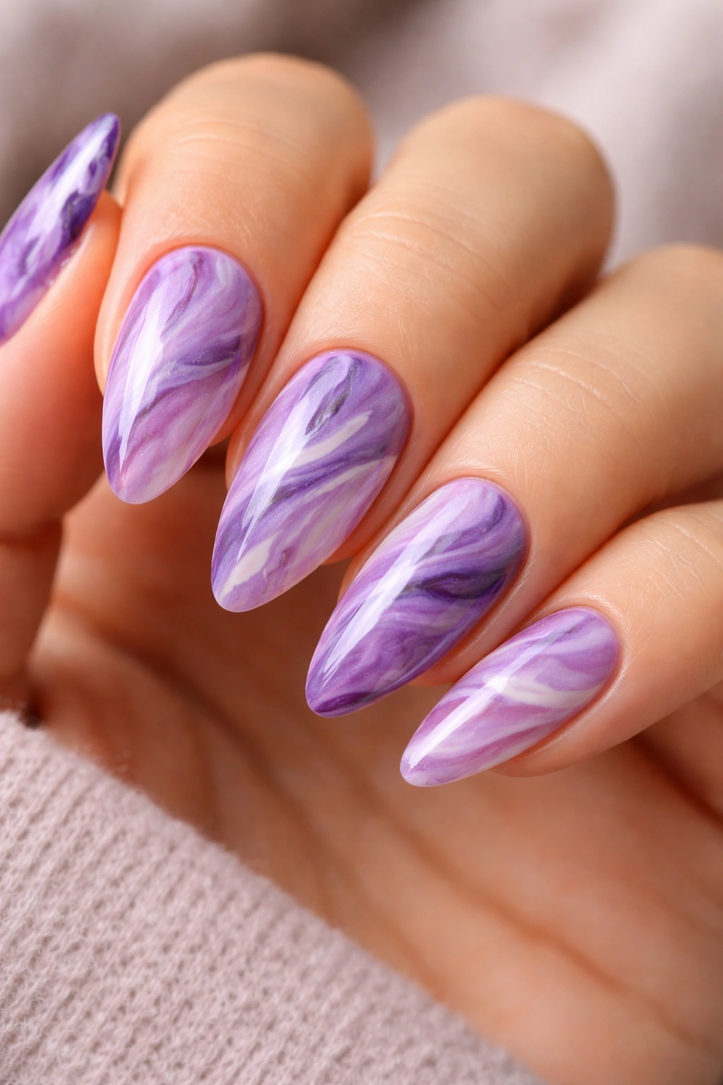Purple marble almond nails with lilac mauve white violet swirls