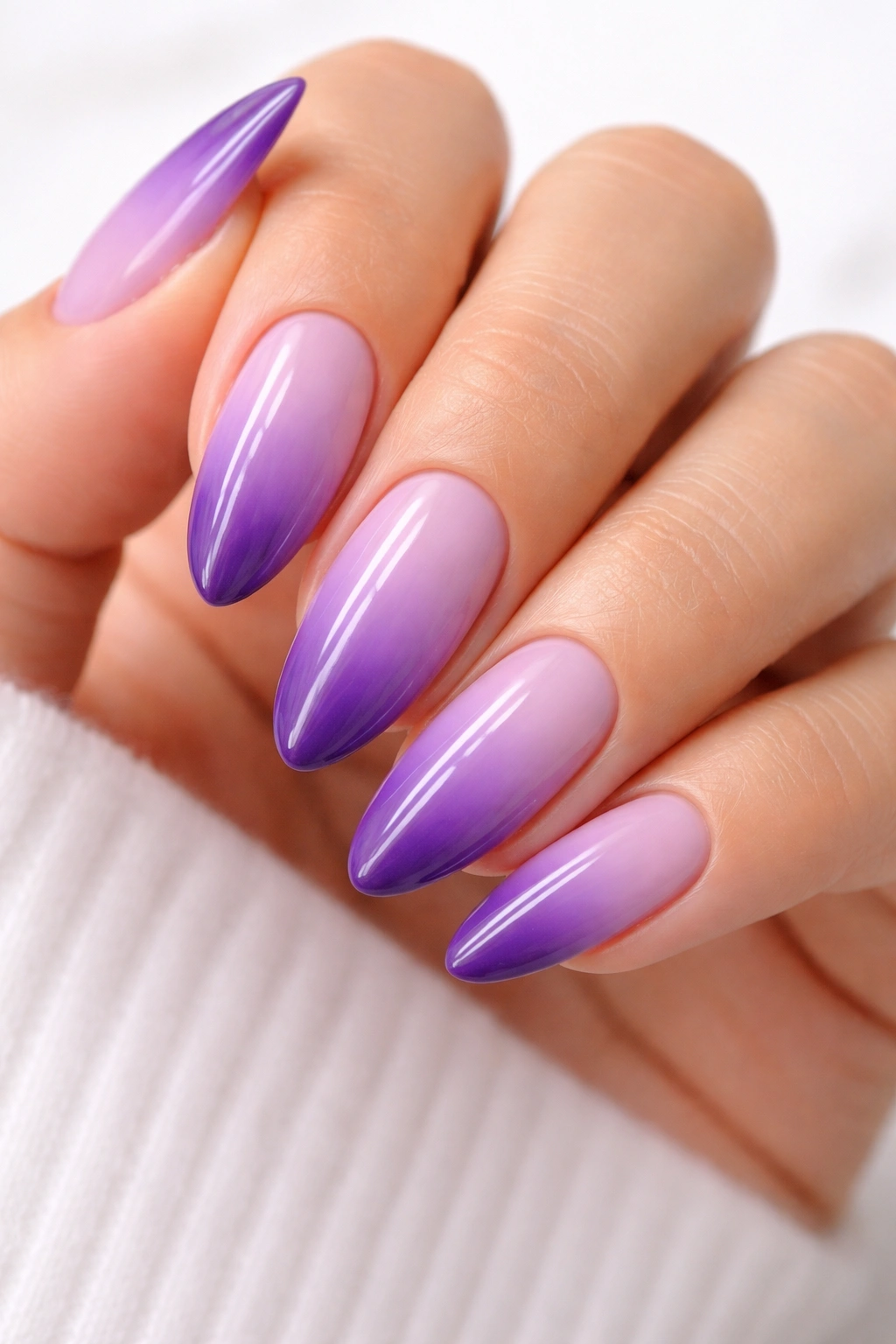 Purple ombre almond nails with lavender to violet gradient