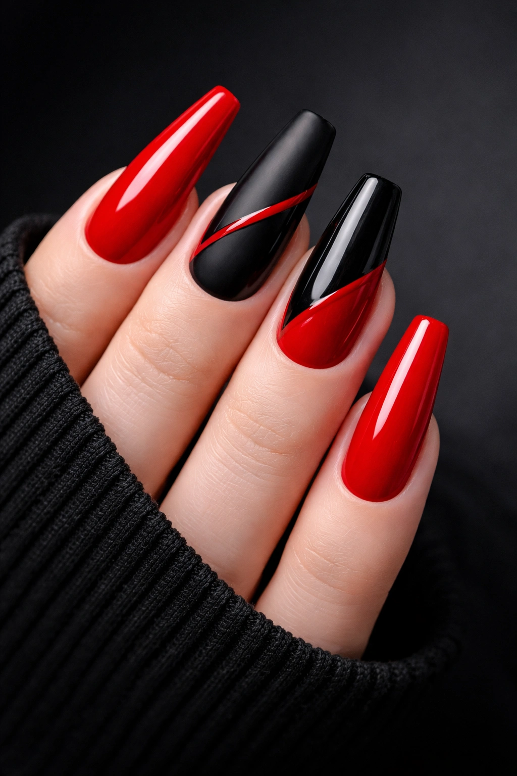 High-contrast red and black nails with alternating colors