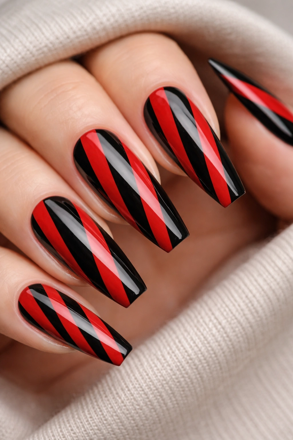 Coffin nails with striped red and black pattern