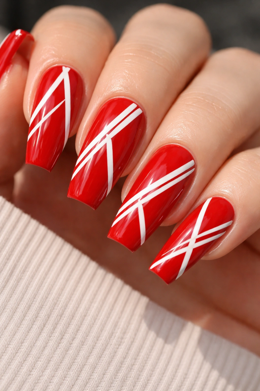 Coffin nail red with white geometric lines on glossy finish
