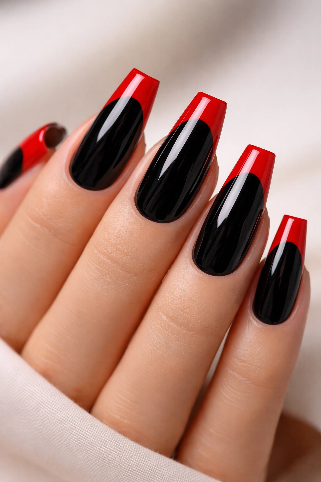 Close-up of coffin nails with black base and red tips