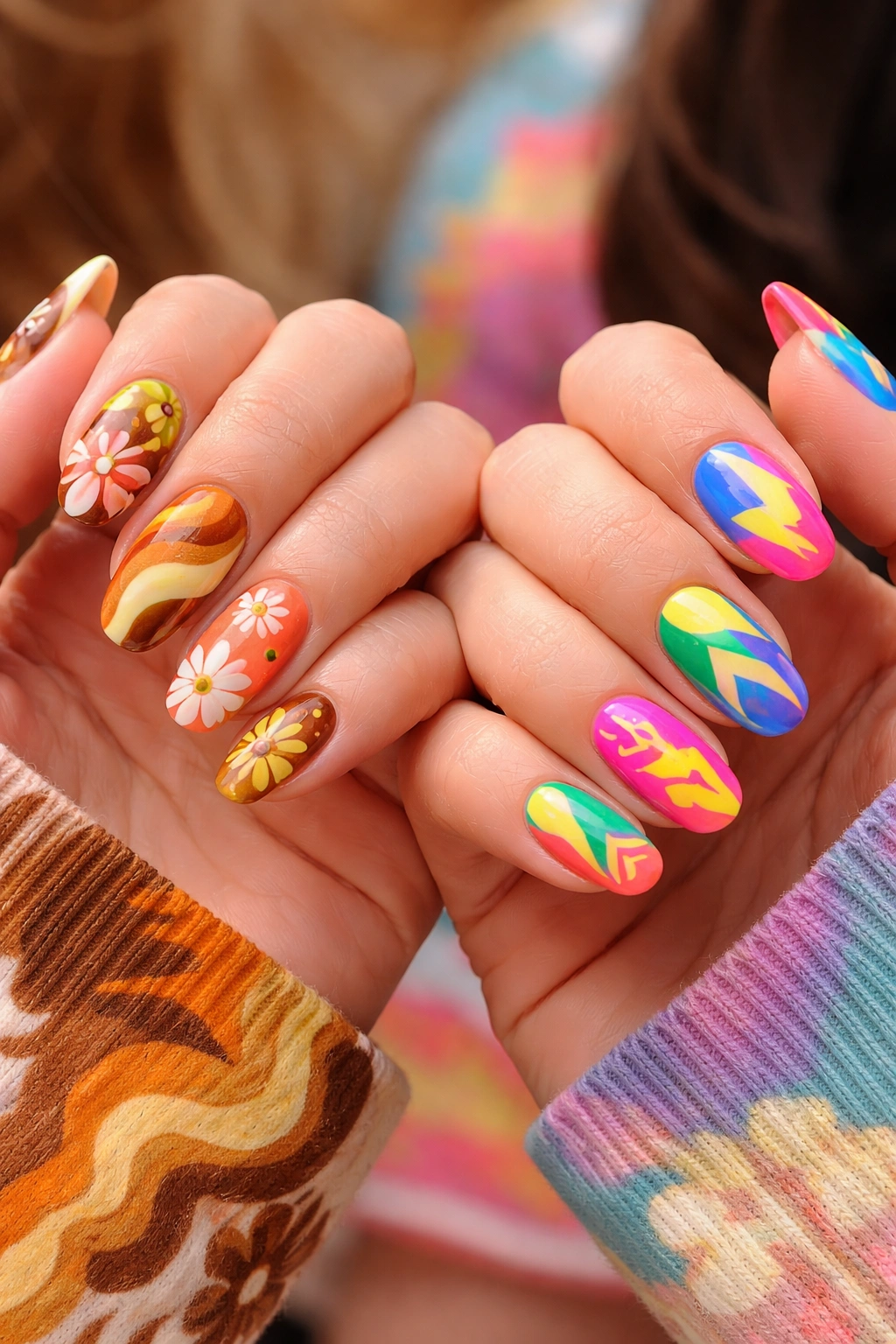 Nails reflecting two different decades with coordinated yet distinct retro designs.