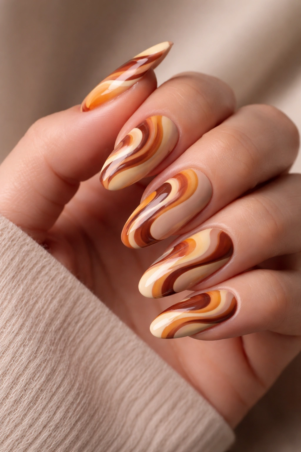 Retro groovy swirl nails in warm earthy tones