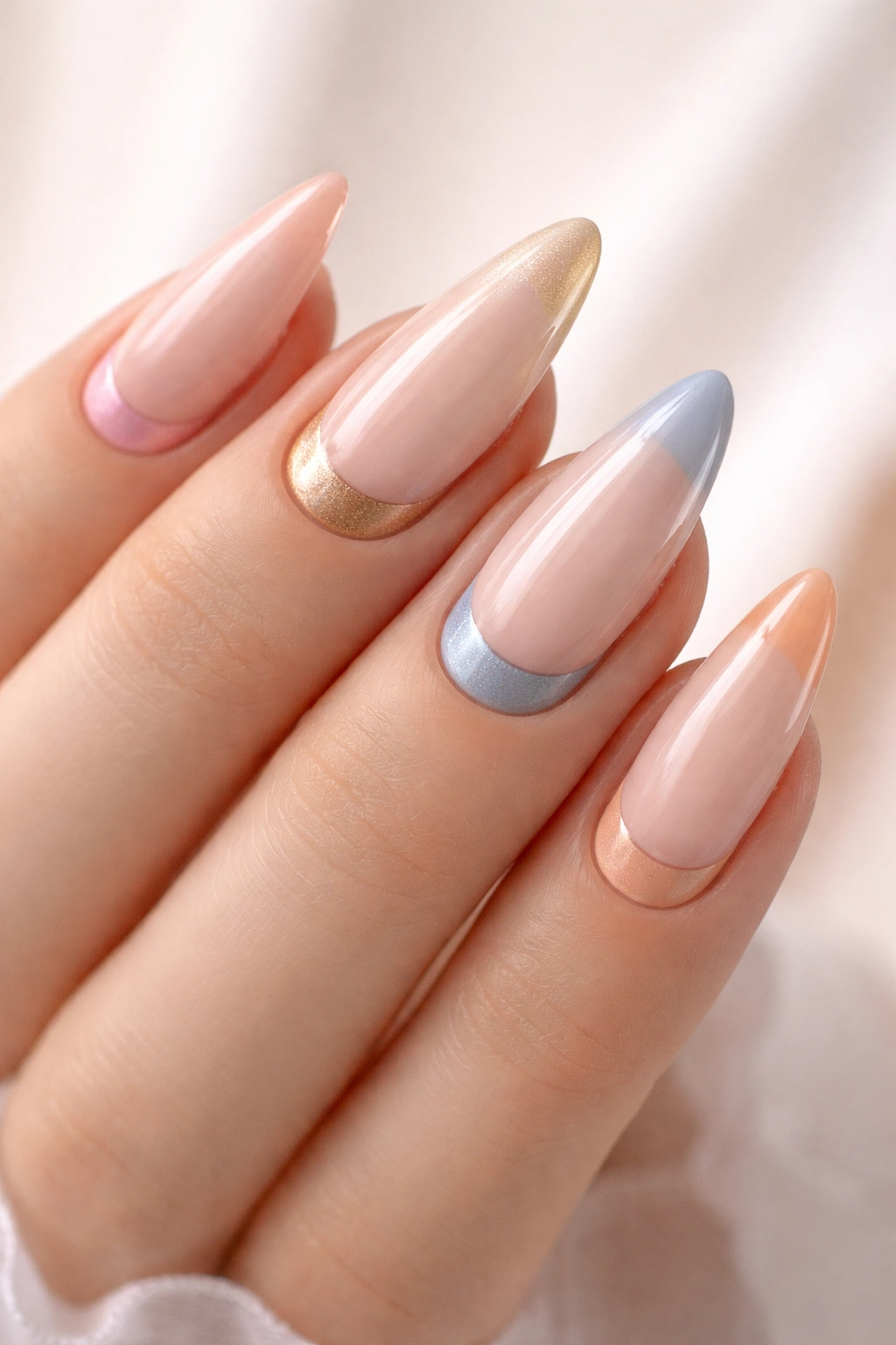 Reverse French tips on almond nails near cuticle