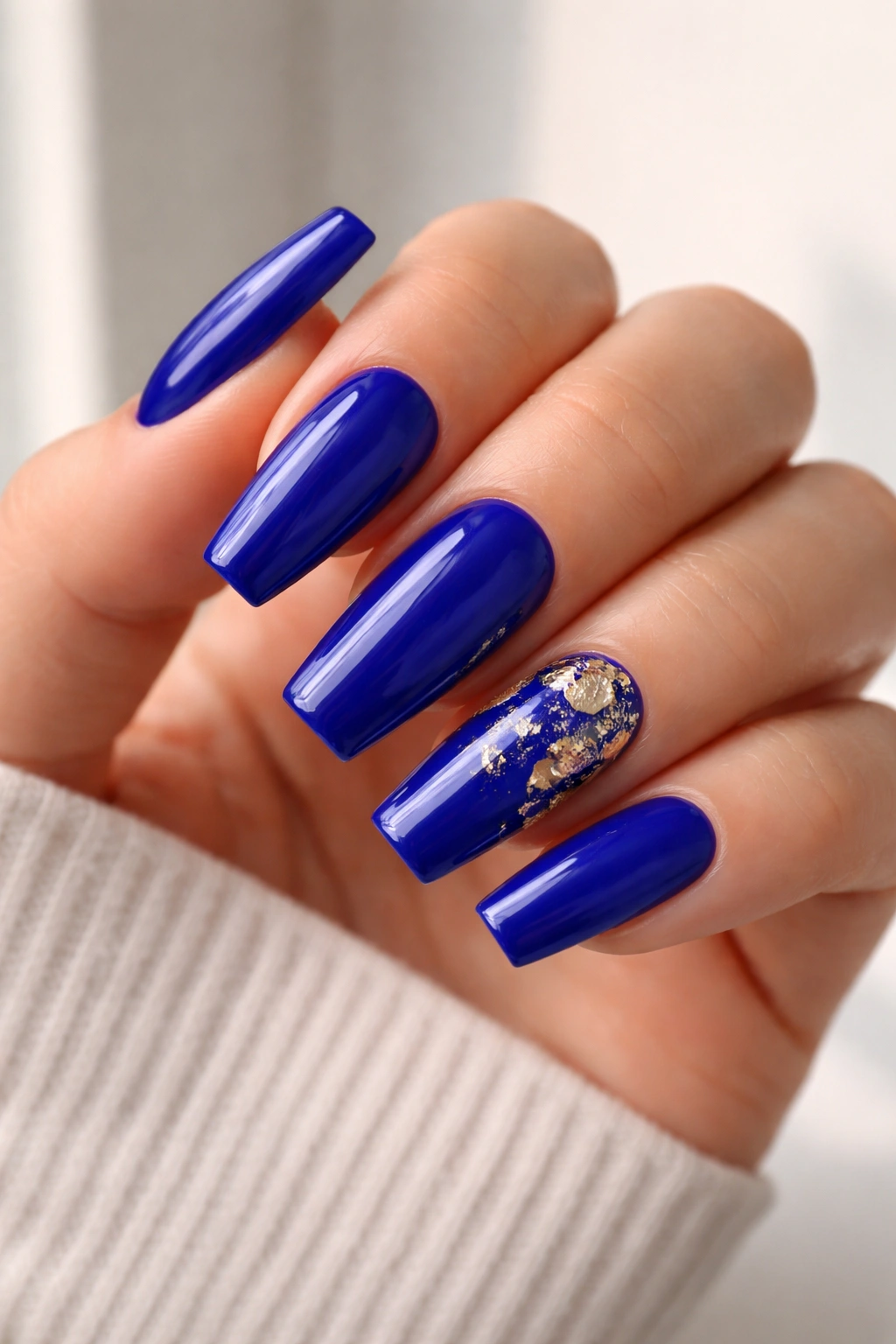 Royal blue coffin nails with a gold foil accent nail