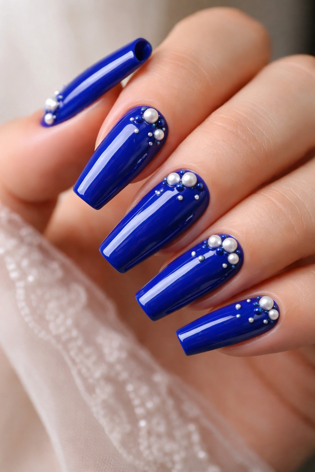 Royal blue coffin nails with pearl accents