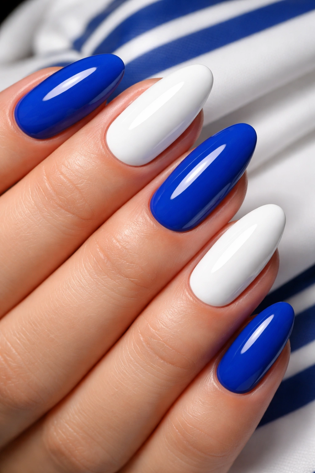 Nails showing royal blue and white color combo