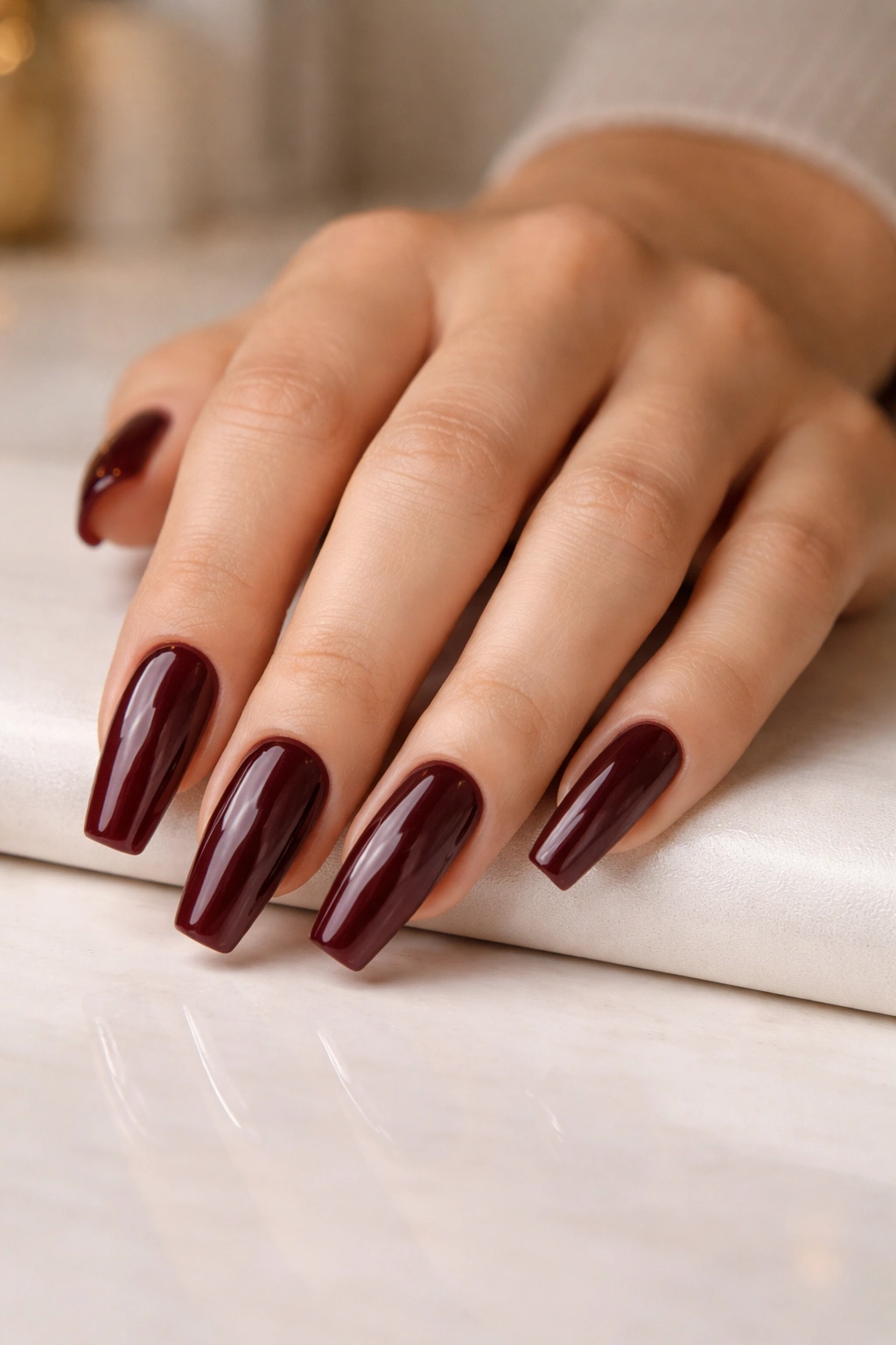 Burgundy ballerina nails with clean base and neat sidewalls