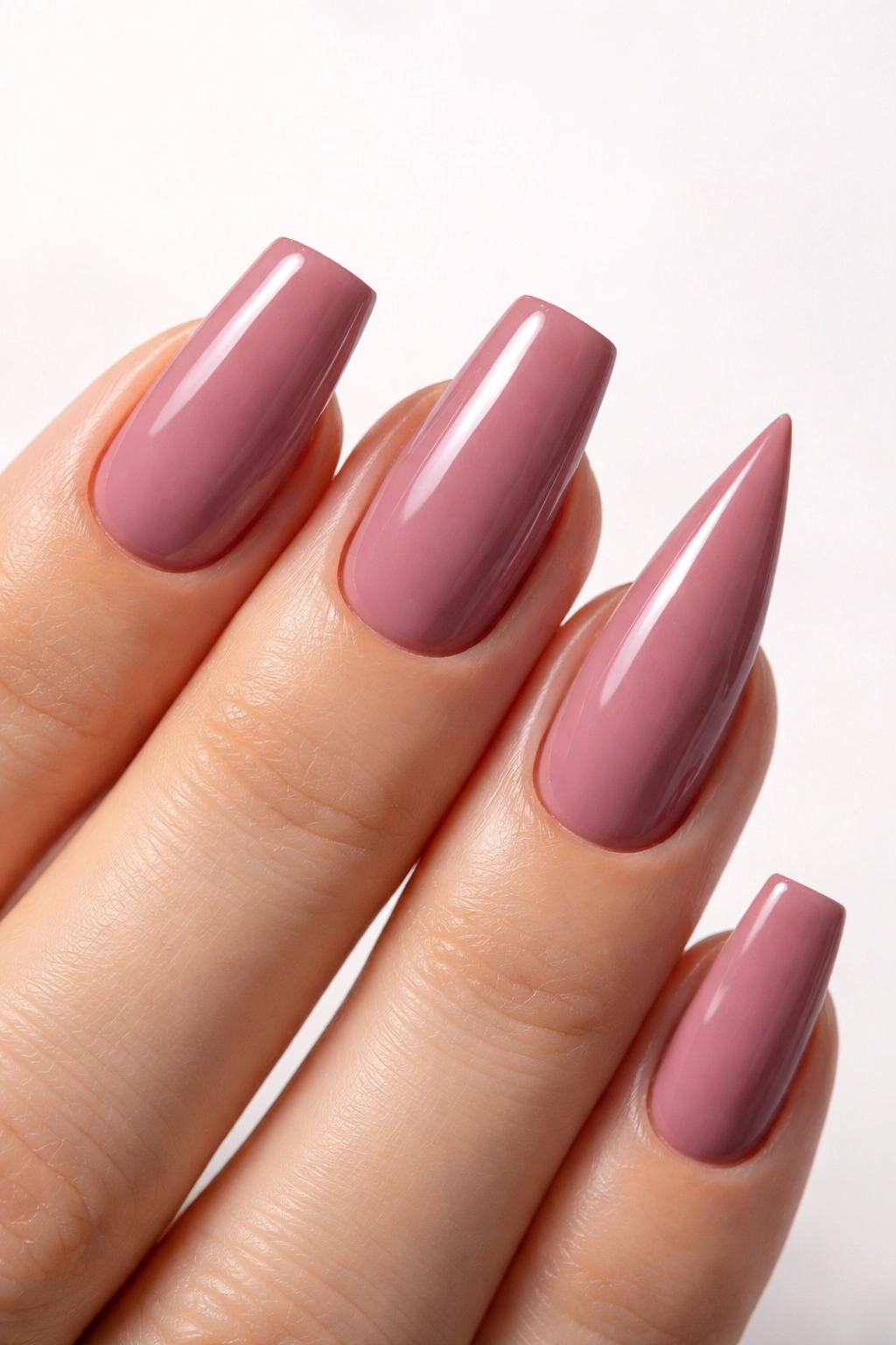 Close-up of nails with sharp edges on a single hand