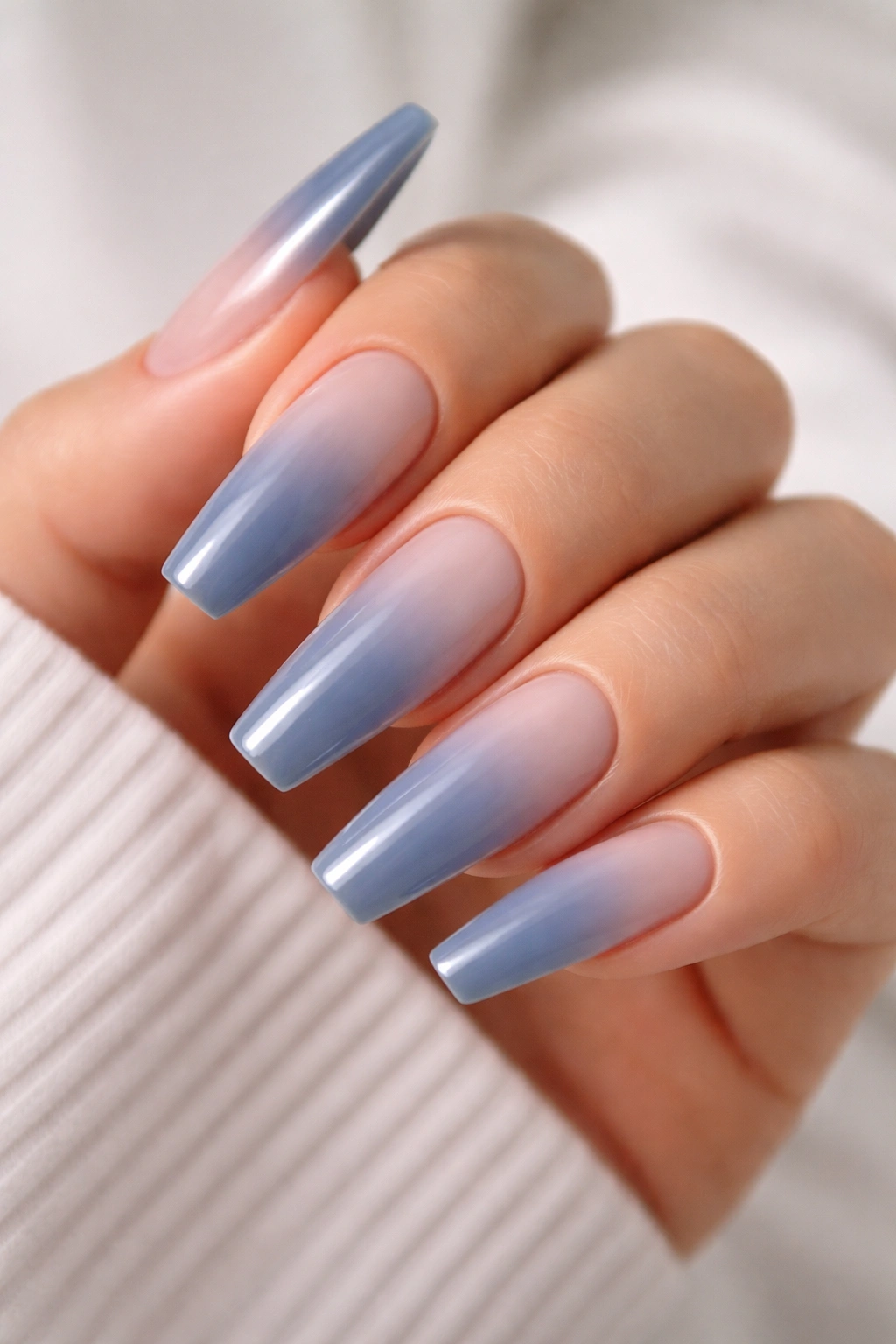 Slate blue aura nails with blurred center glow on ballerina nails