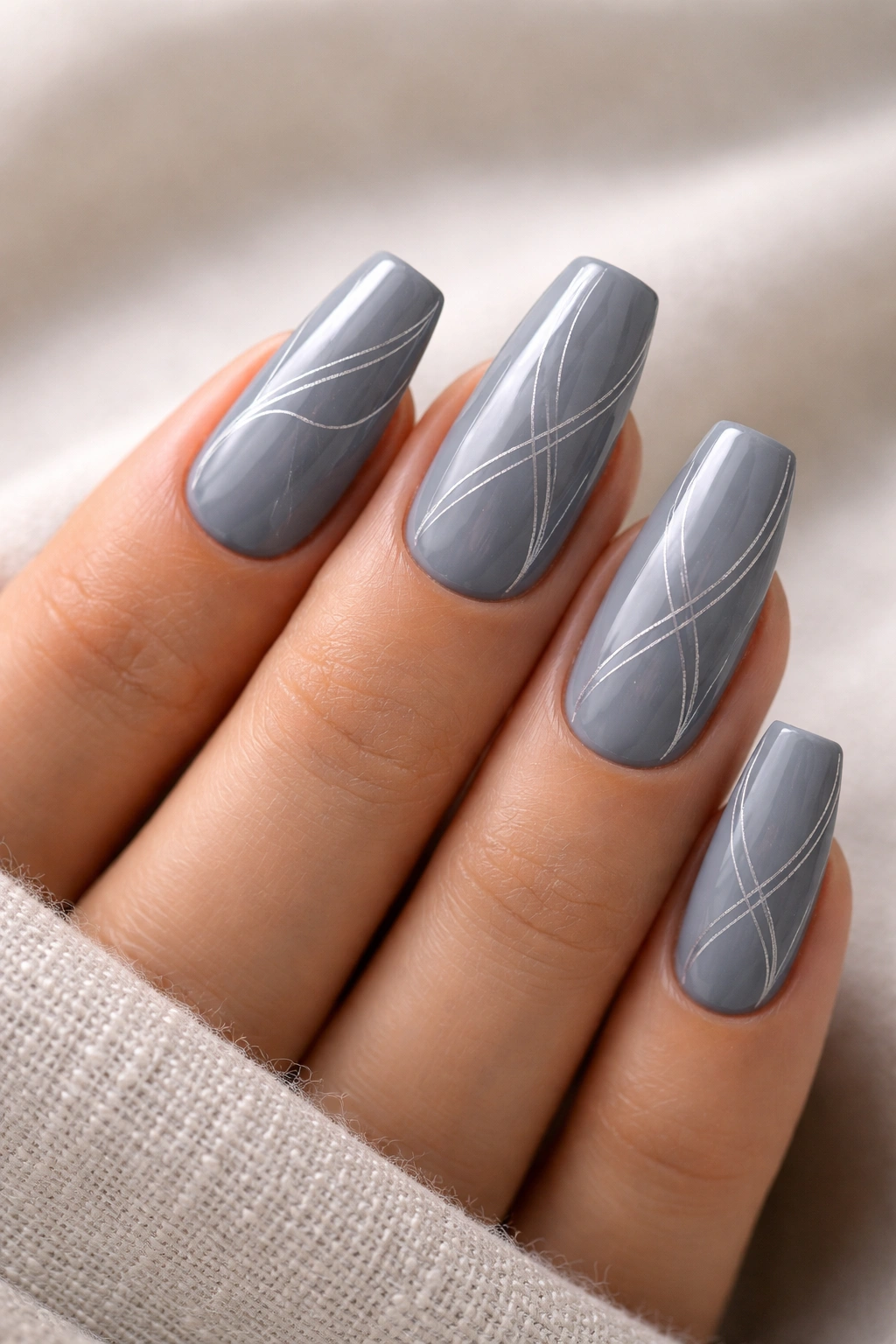 Close-up of slate gray coffin nails with fine white line art