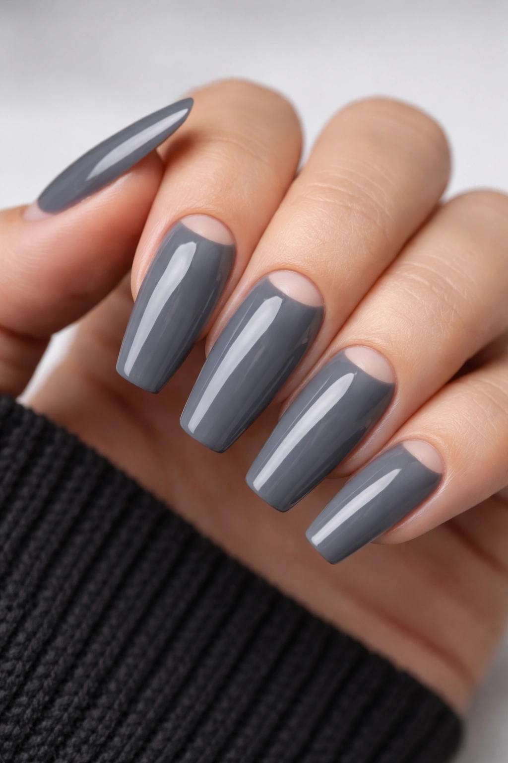 Slate grey ballerina nails with negative-space half moons