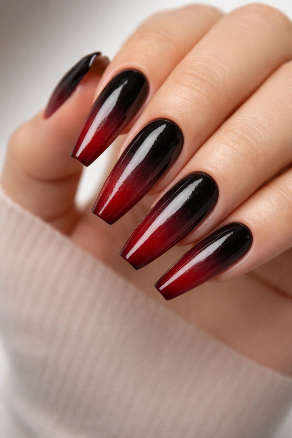 Black to red smoke ombré on ballerina nails