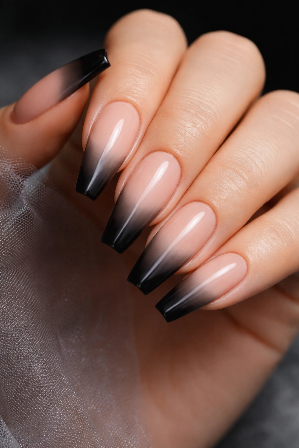 Smoked ombré black French tip on ballerina nails with soft fade