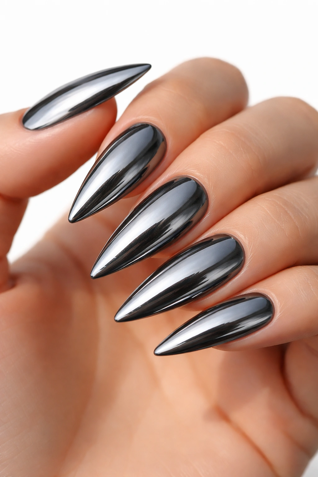 Close-up of smoky gray nails with a mirror finish reflecting light