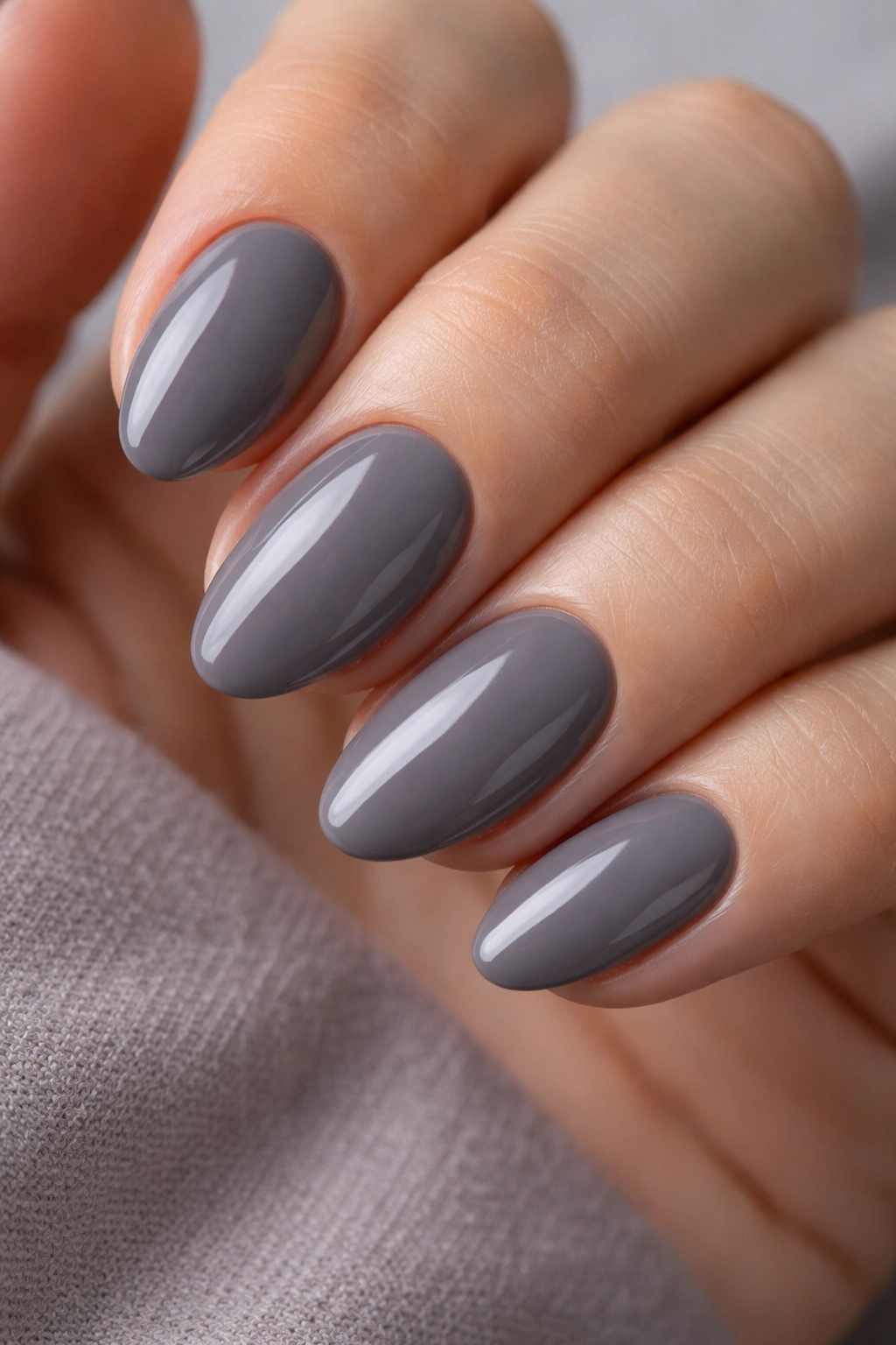 Smoky gray short almond nails with glossy finish