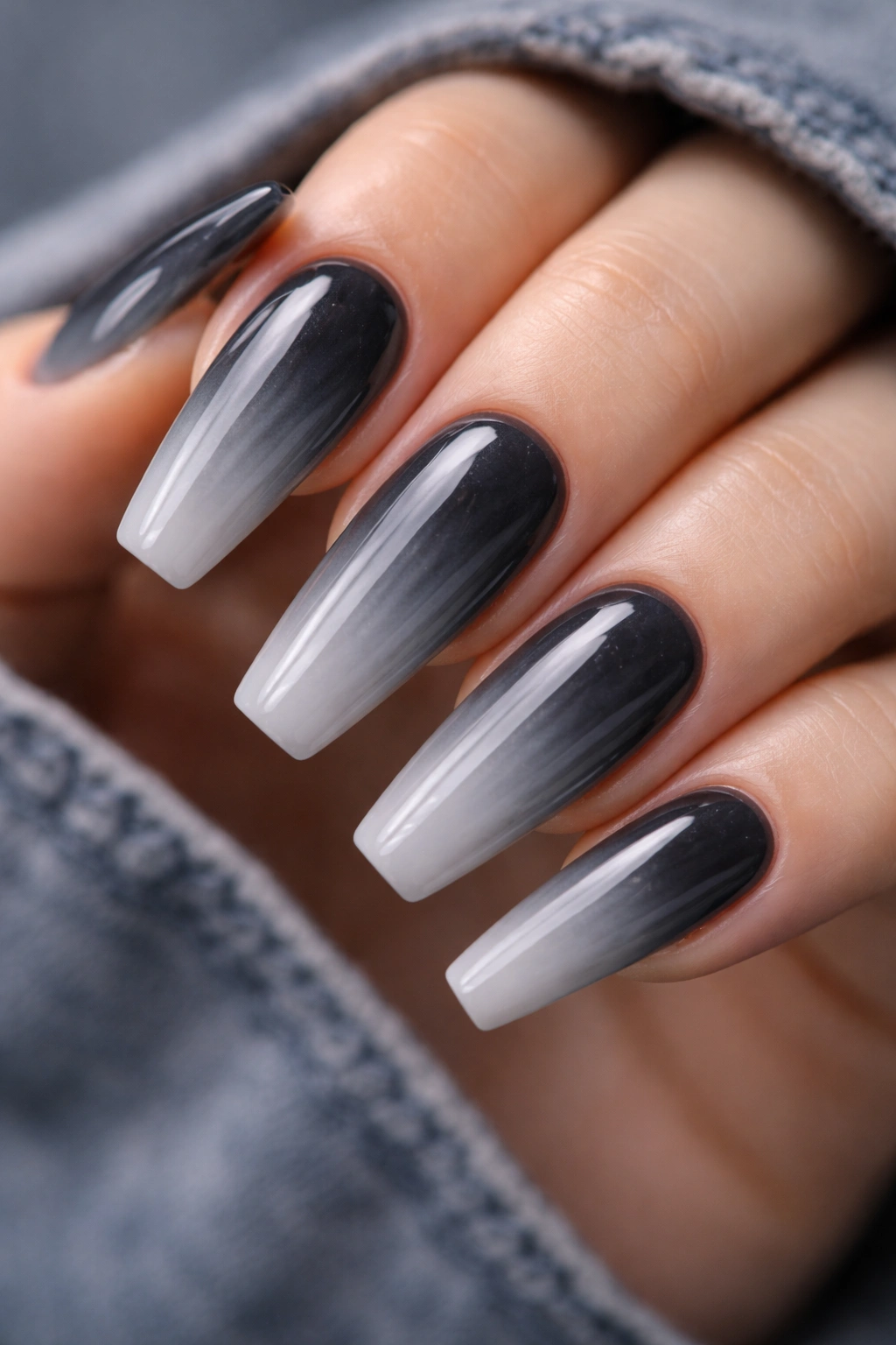 Long ballerina nails with smoky grey ombre fading toward cuticle