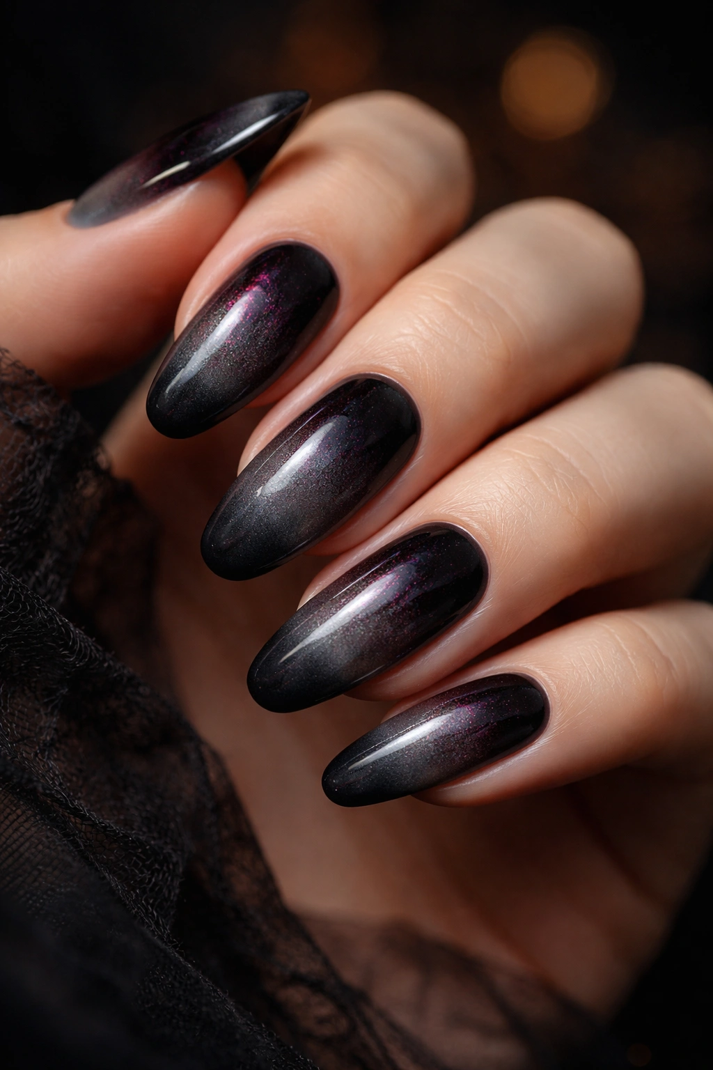 Nails with smoky ombre gradient from charcoal to ash gray
