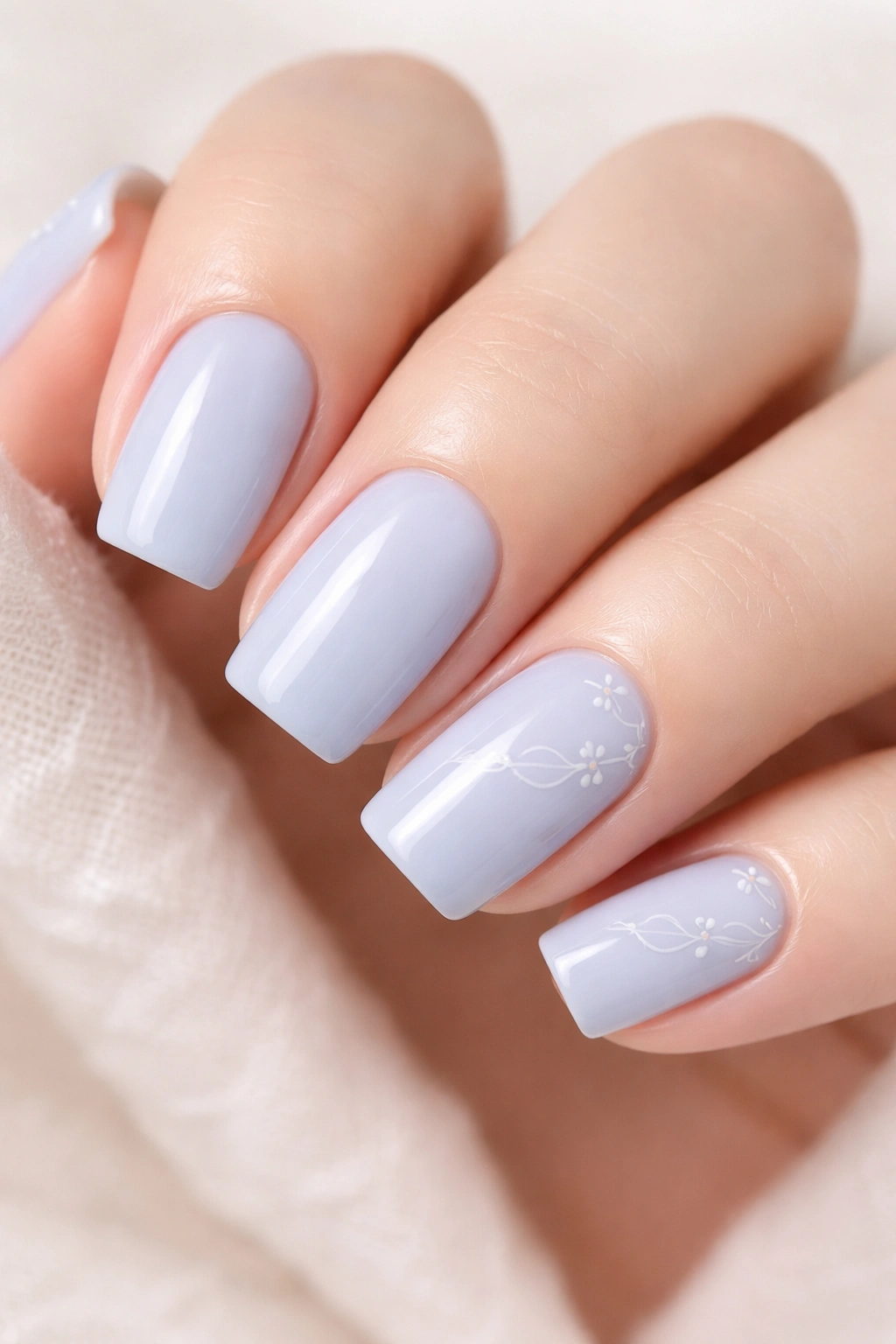 Soft Blueberry manicure with minimalist floral line art