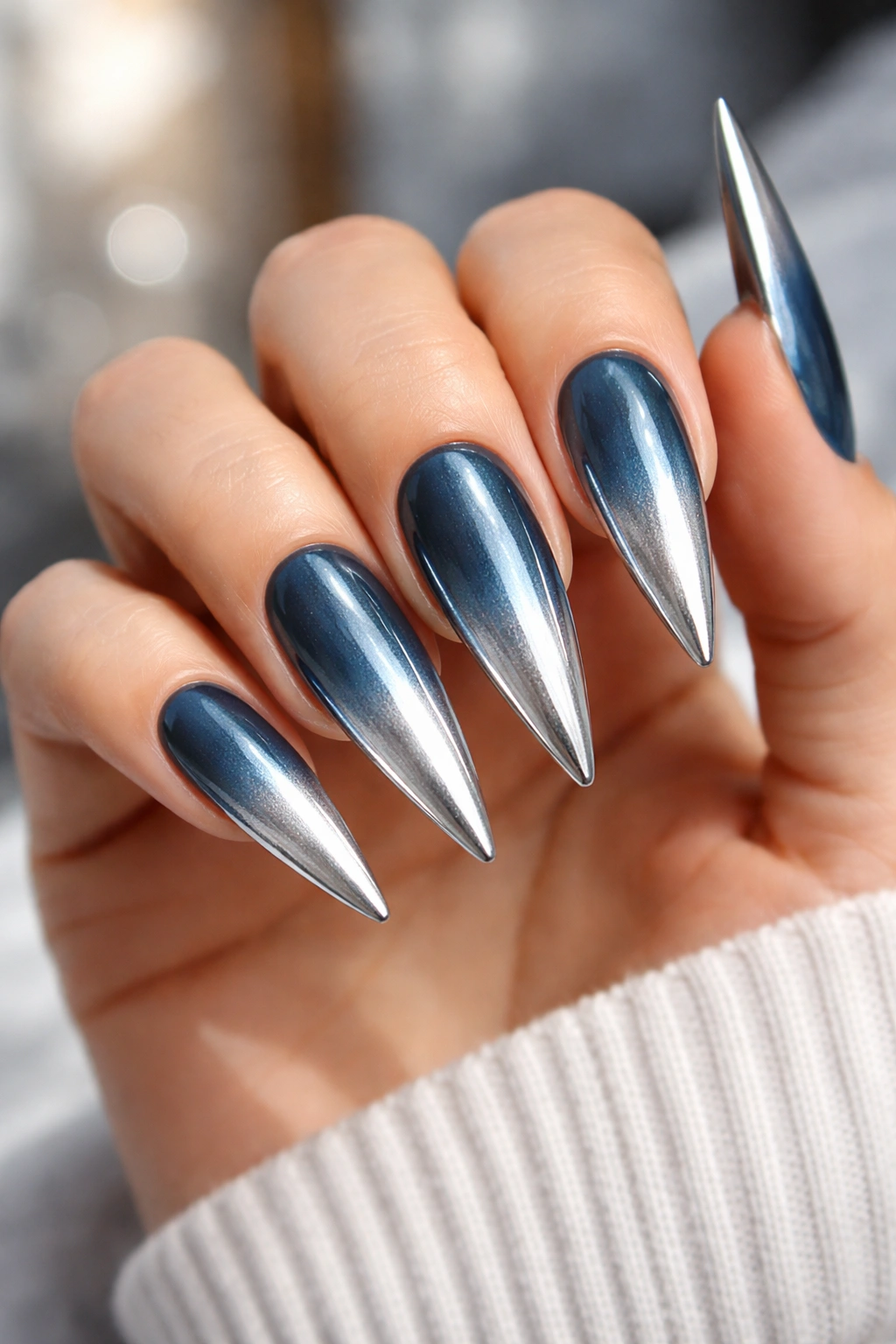 Steel blue to silver reverse ombré on stiletto nails