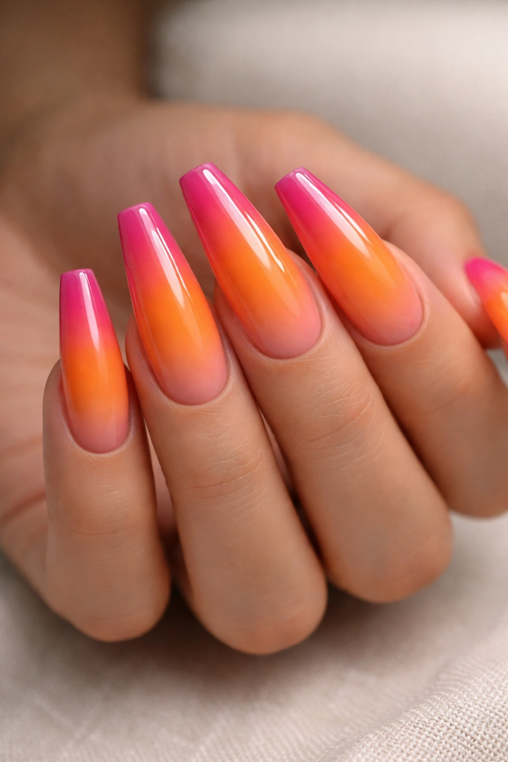 Sunset orange to magenta ombre on ballerina nails