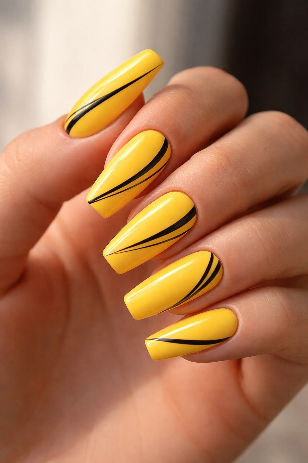 Taxi yellow nails with subtle black line art