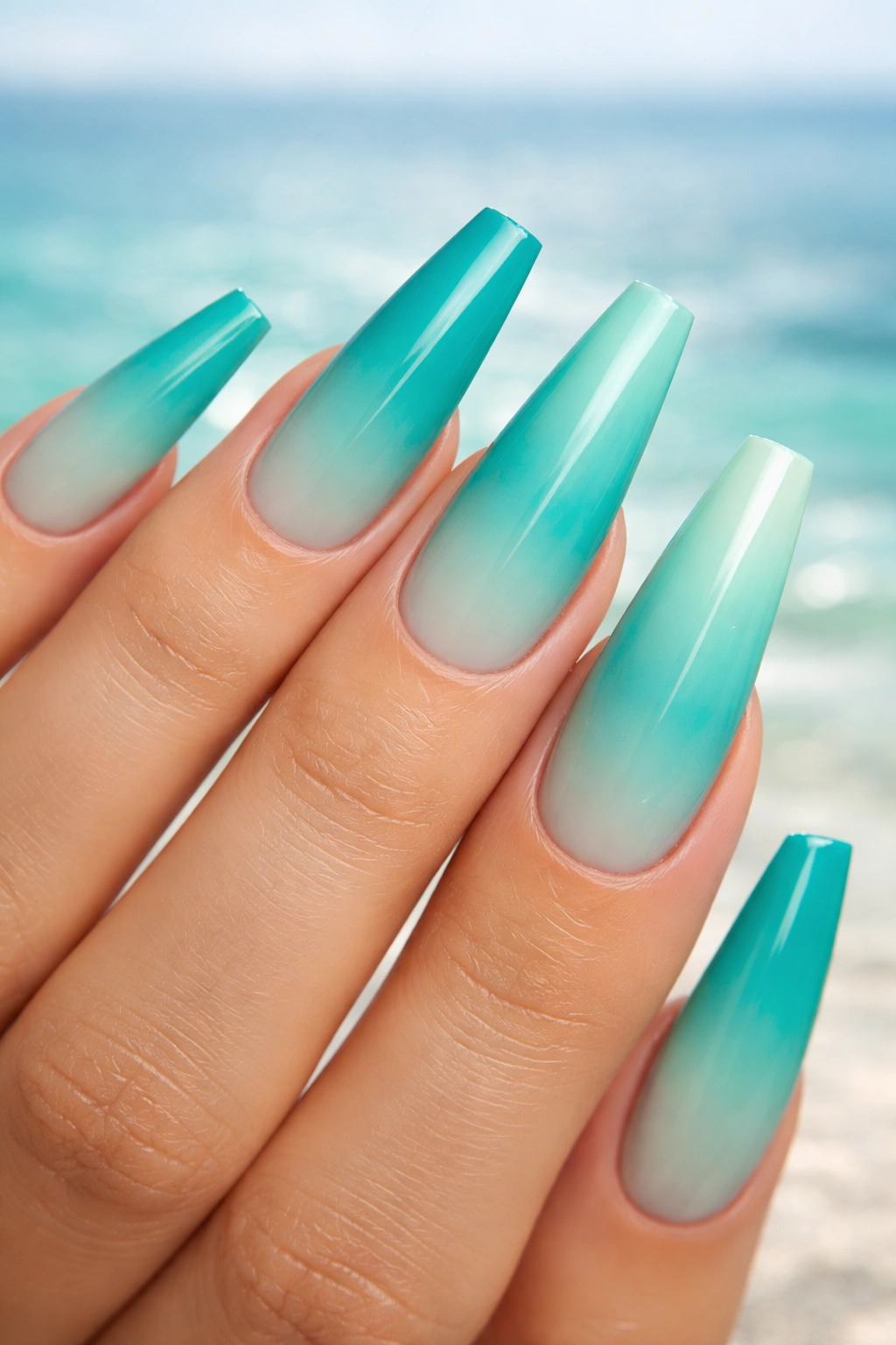 Teal to mint green ombre on coffin nails