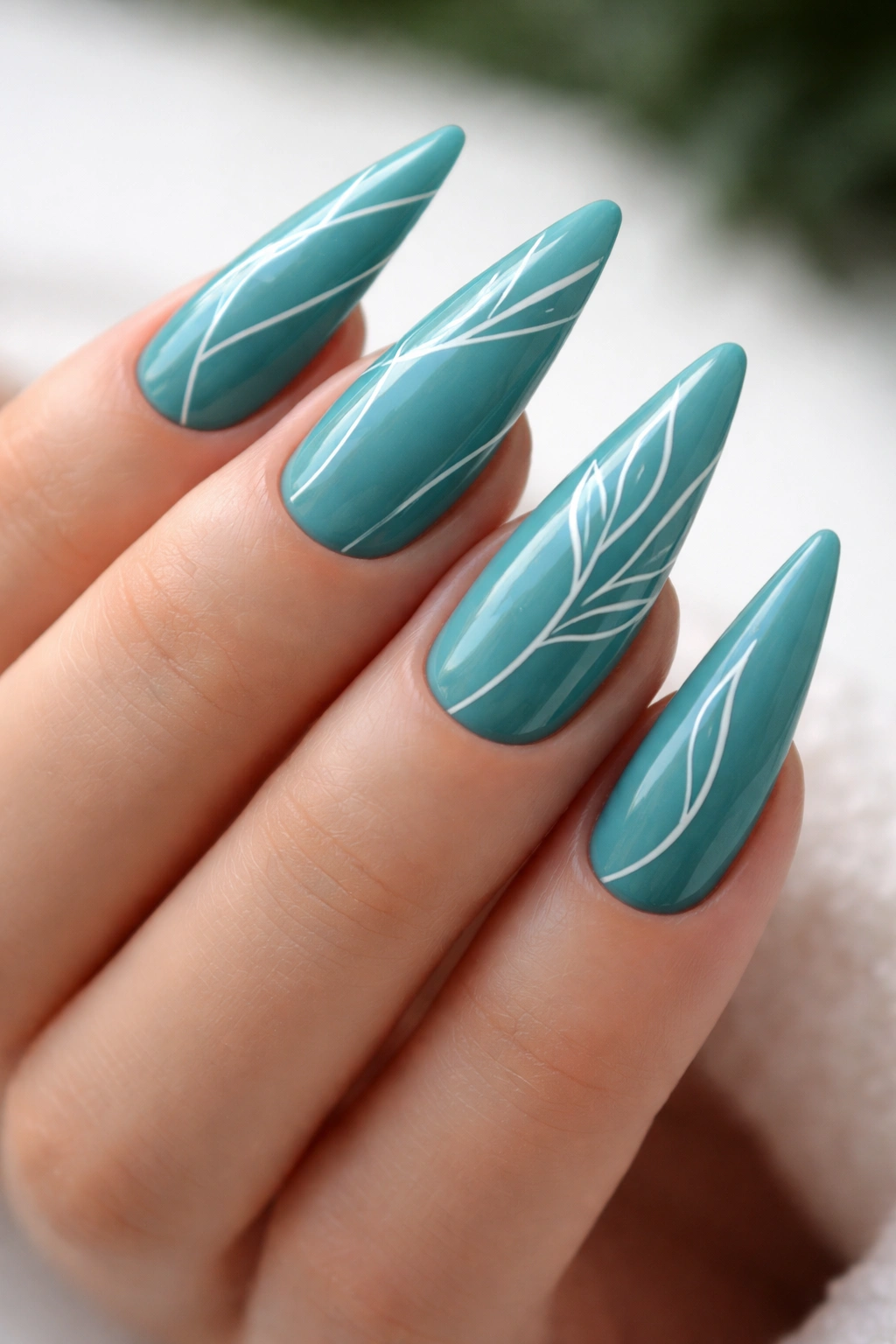 Teal nails with white minimalist line art