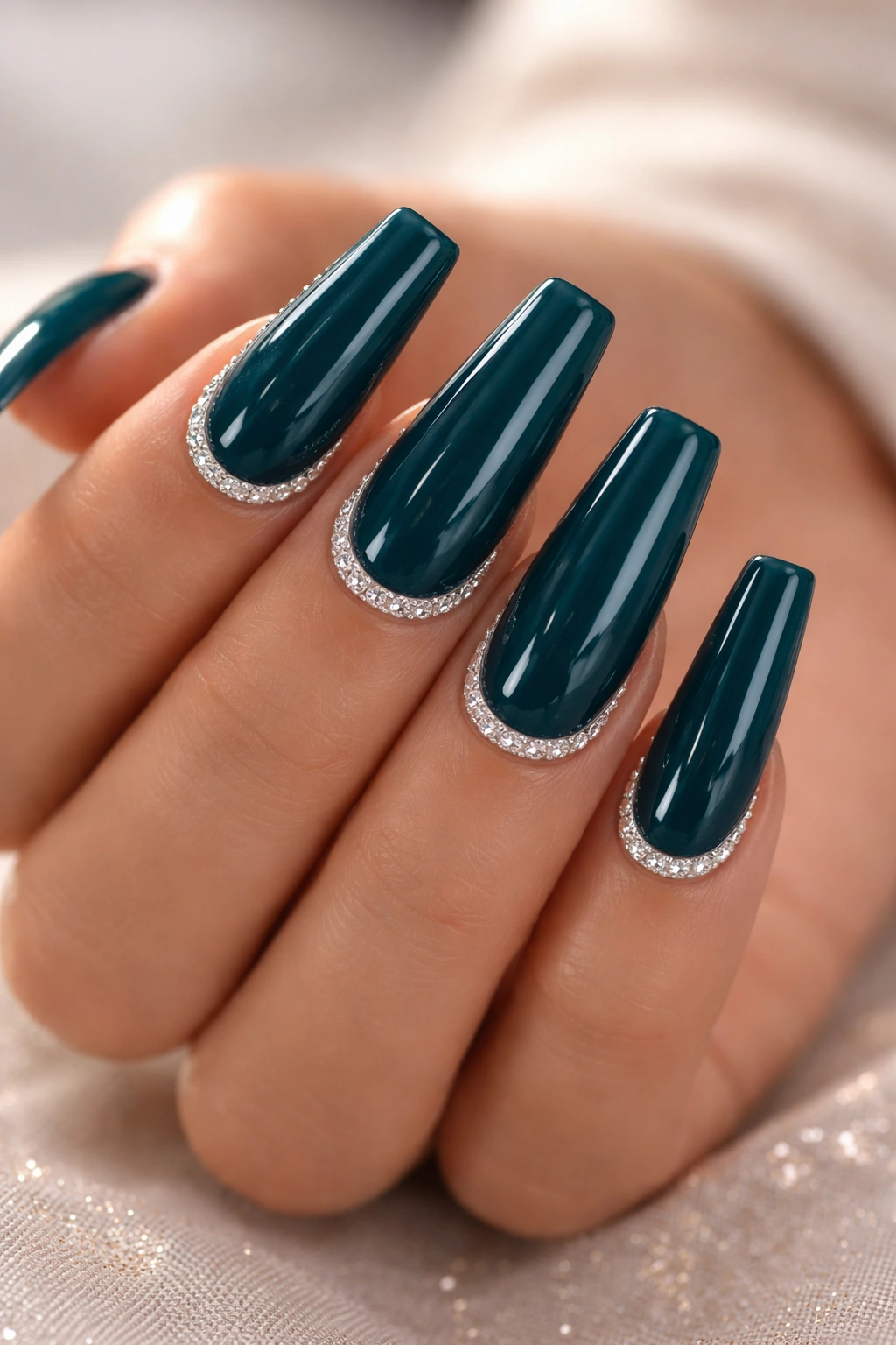 Coffin nails in deep teal with rhinestone border along edge