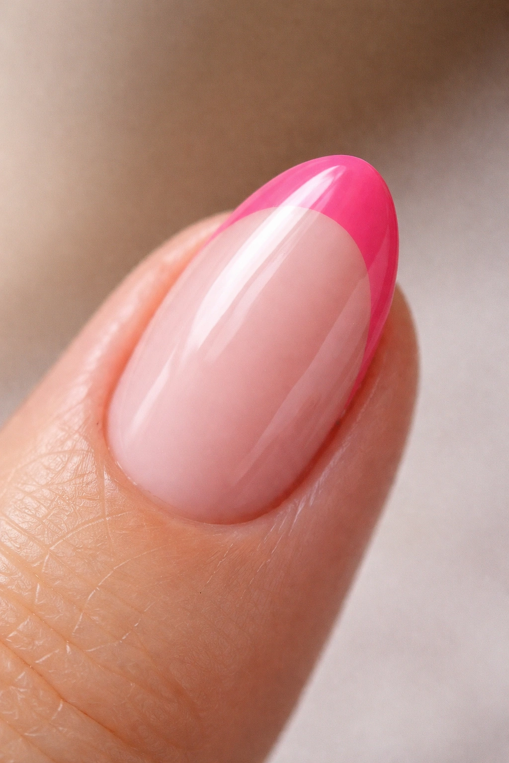 Macro view of short almond nail showing pink tip width 1.5-3mm