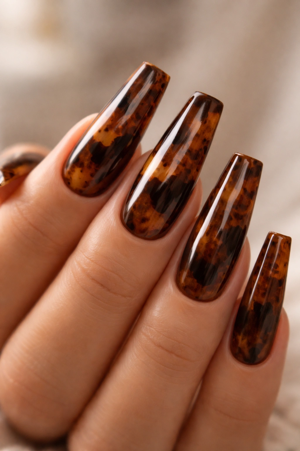 Coated nails with tortoiseshell pattern on coffin nails