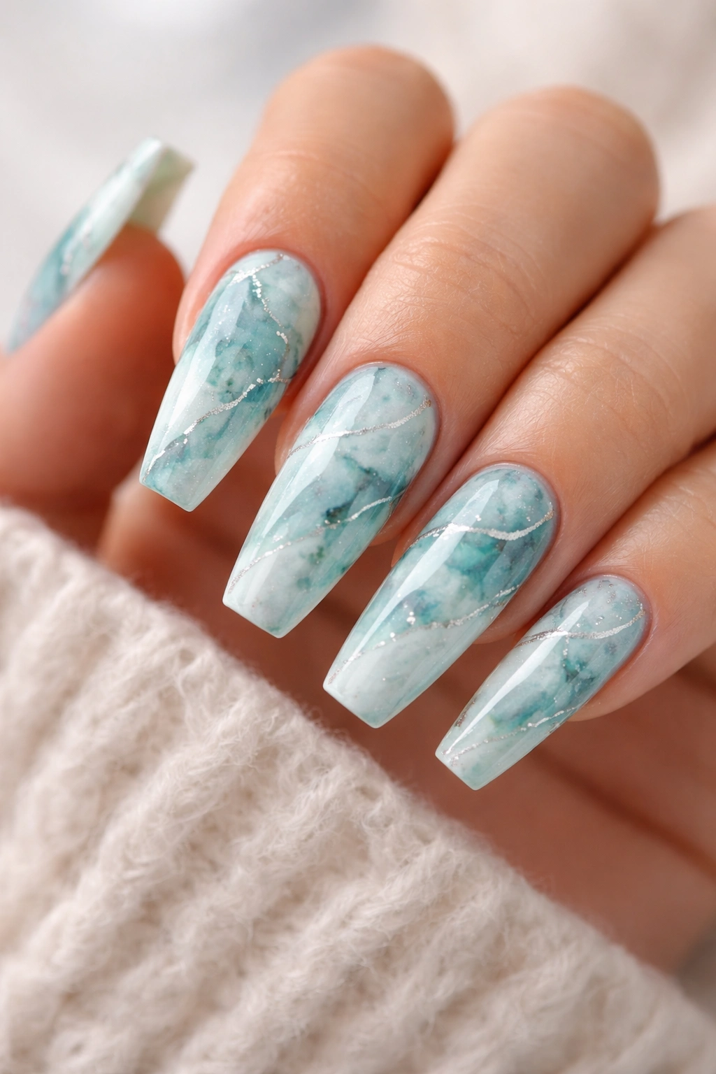 Turquoise marble nails with silver veins on ballerina shape