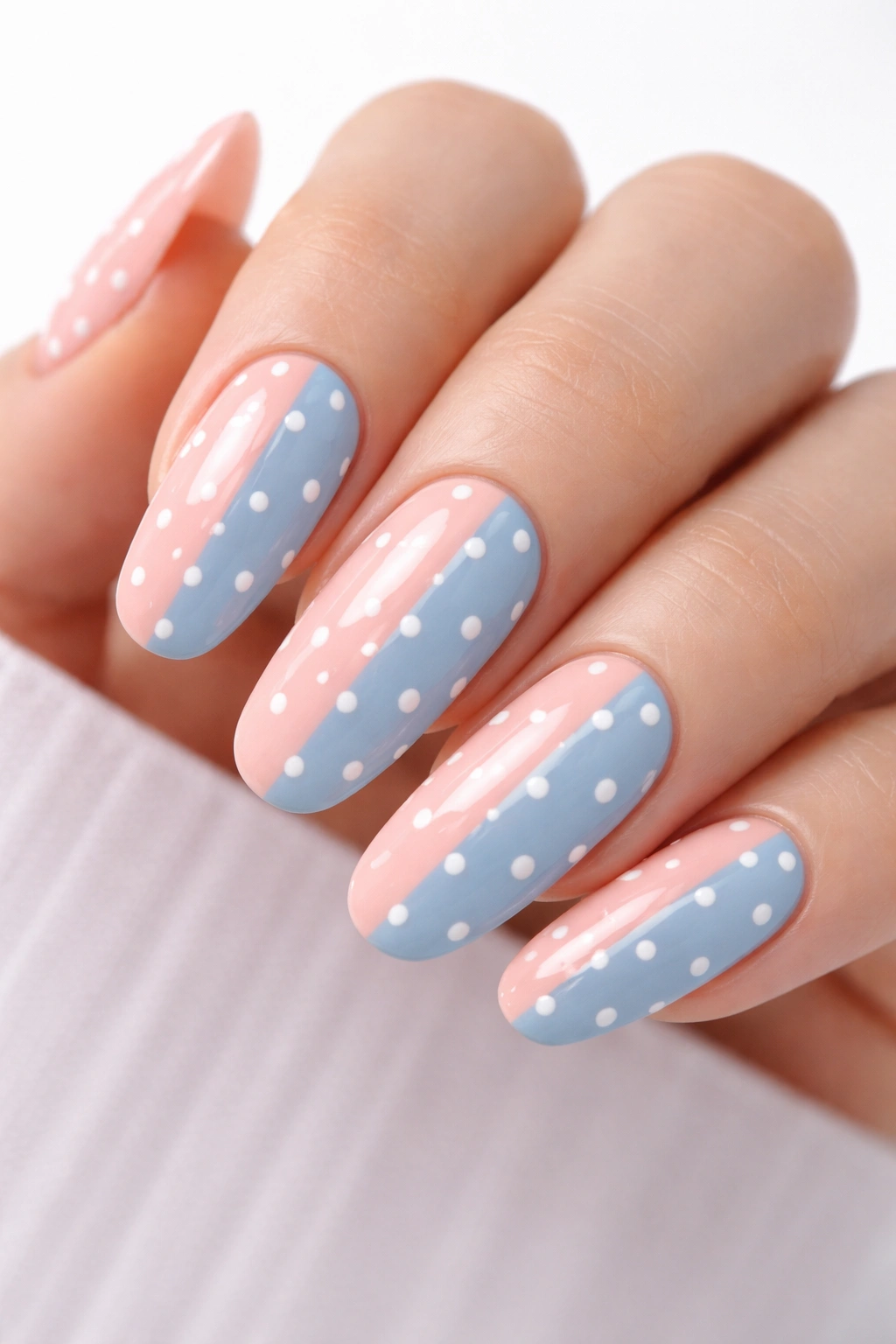 Two-tone nails with dotted overlay in pink and blue