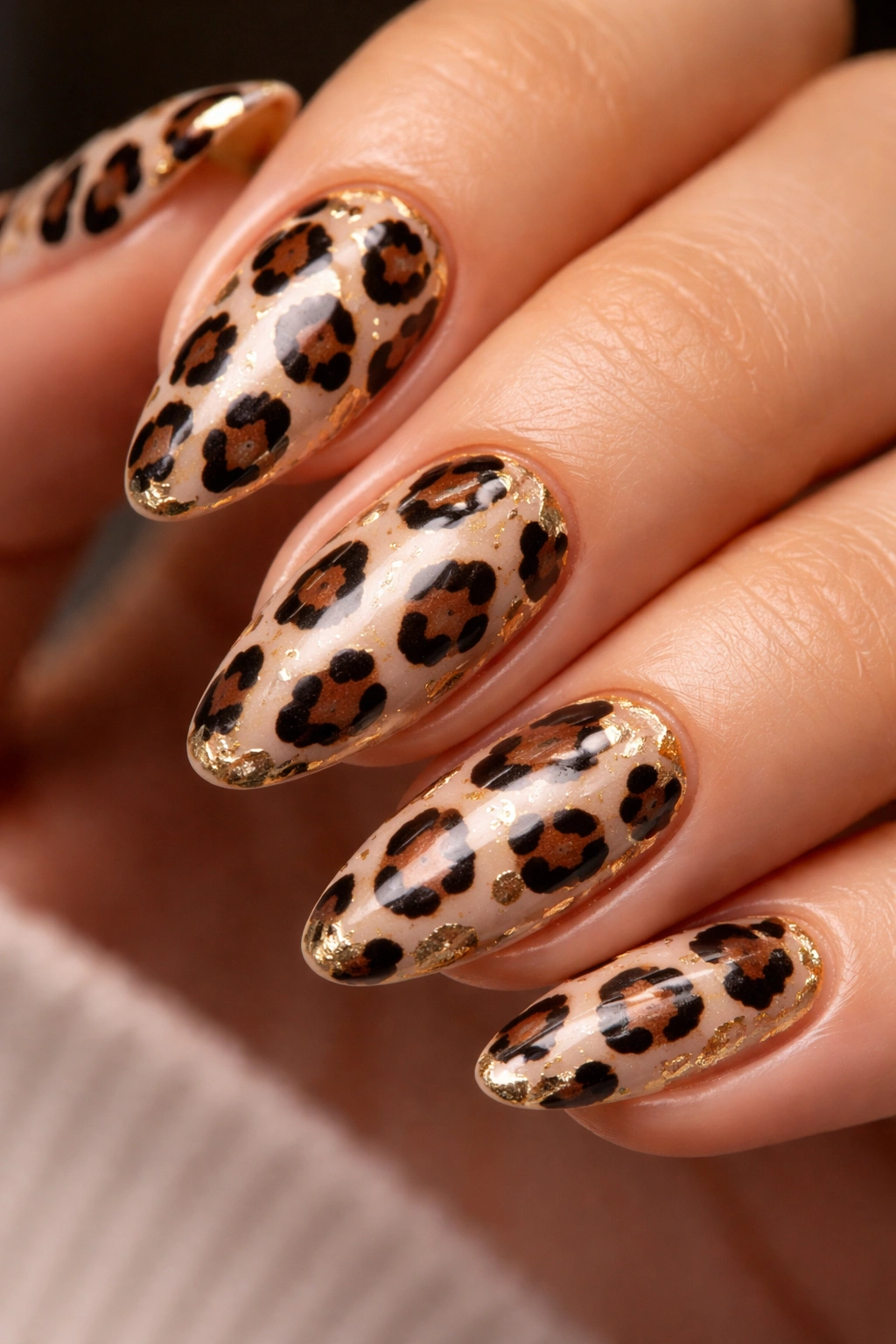 Leopard nails with two-tone spots and metallic foil