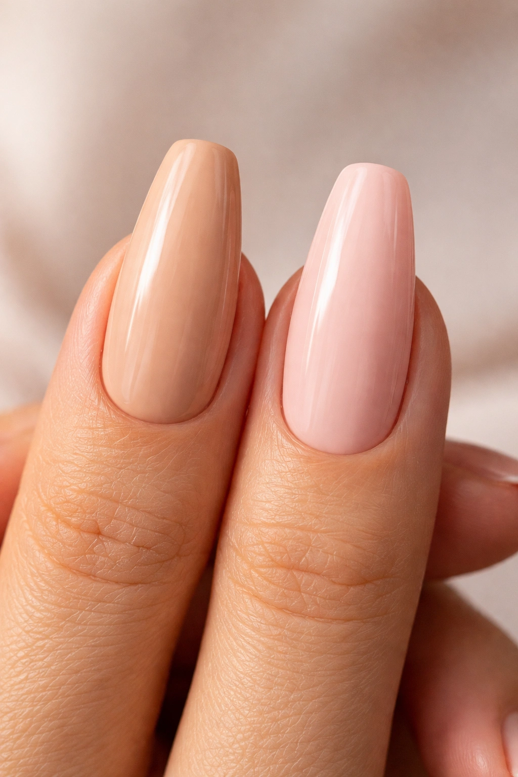 Hand with two nude nails showing warm and cool undertones