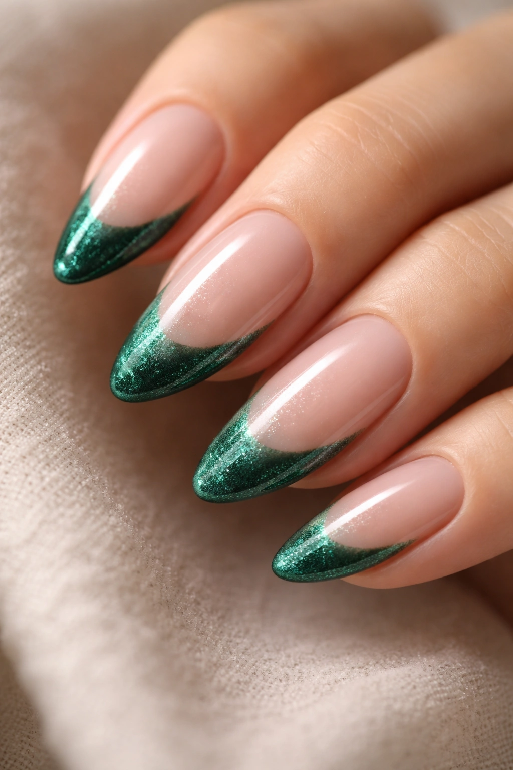 Almond nails with velvet-textured emerald tips