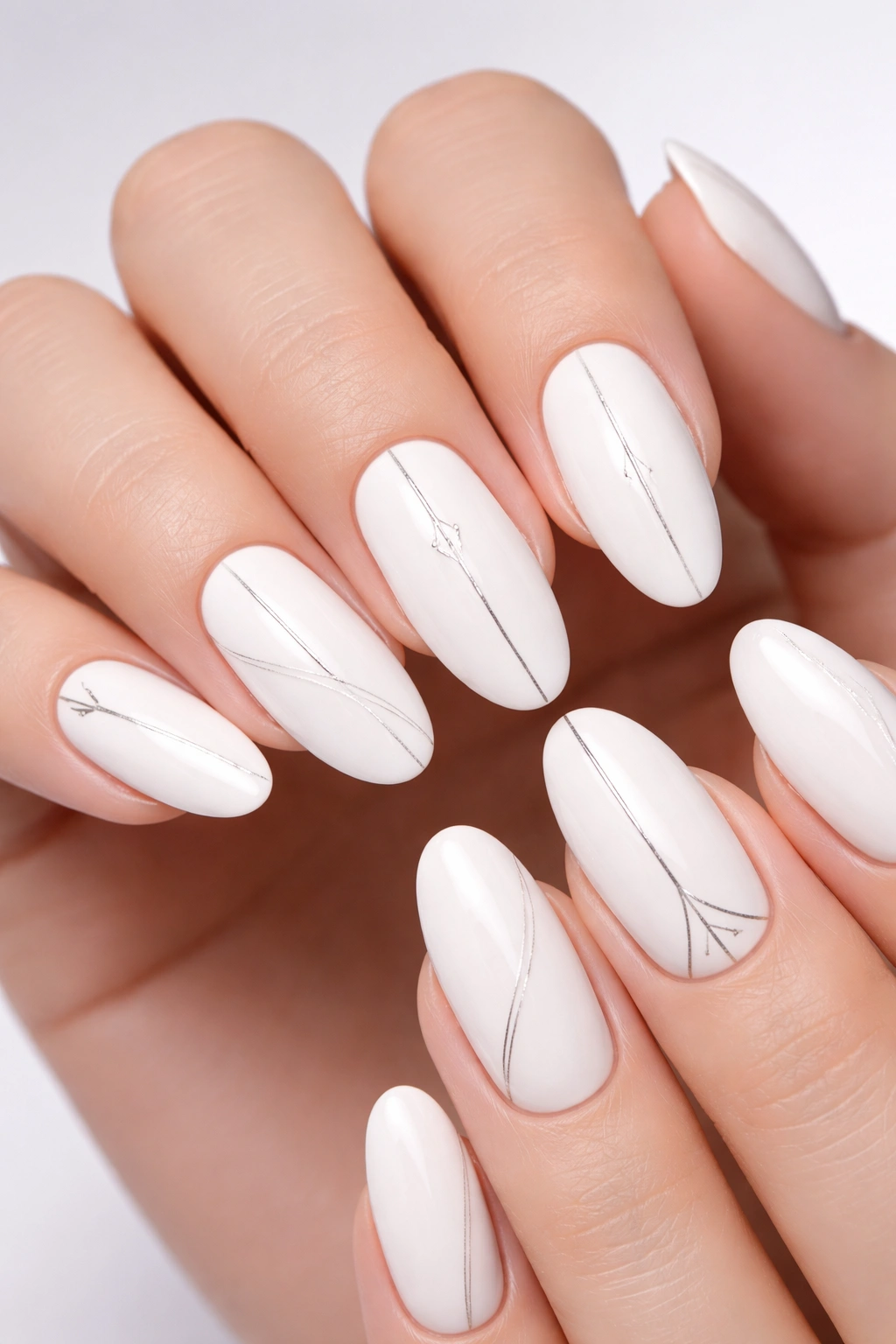 White long oval nails with minimalist black line design