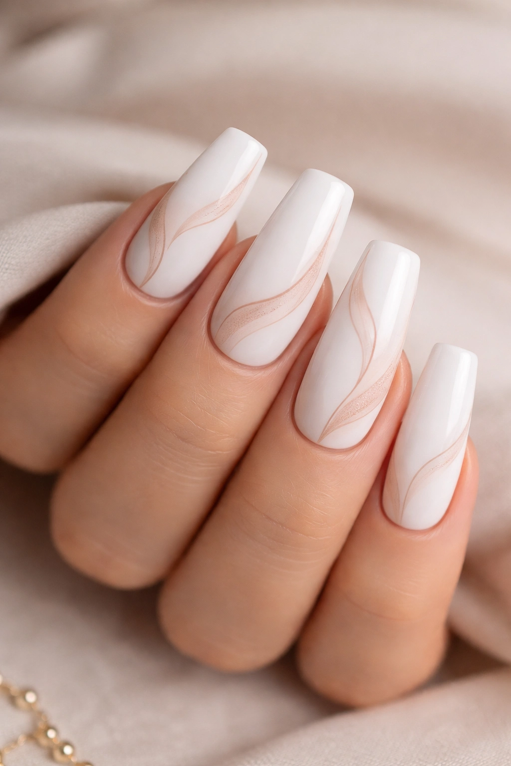 Coffin nails with subtle nude detailing on white base