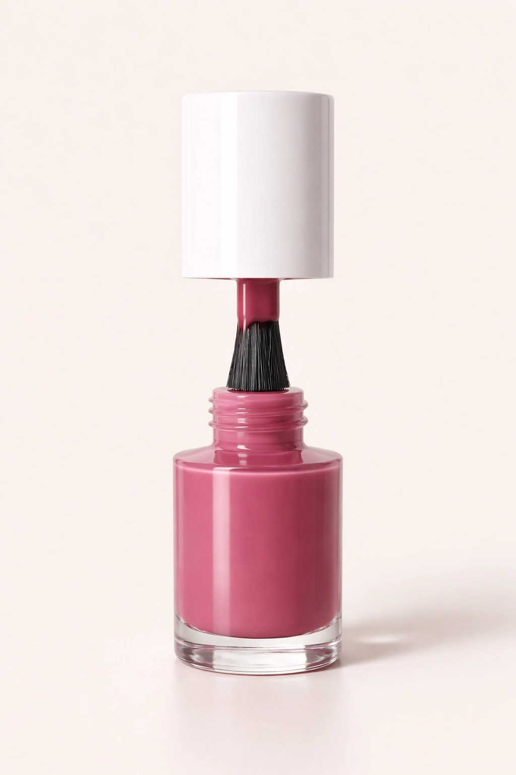 Nail polish bottle silhouette with wide brush, showcasing long-lasting color.