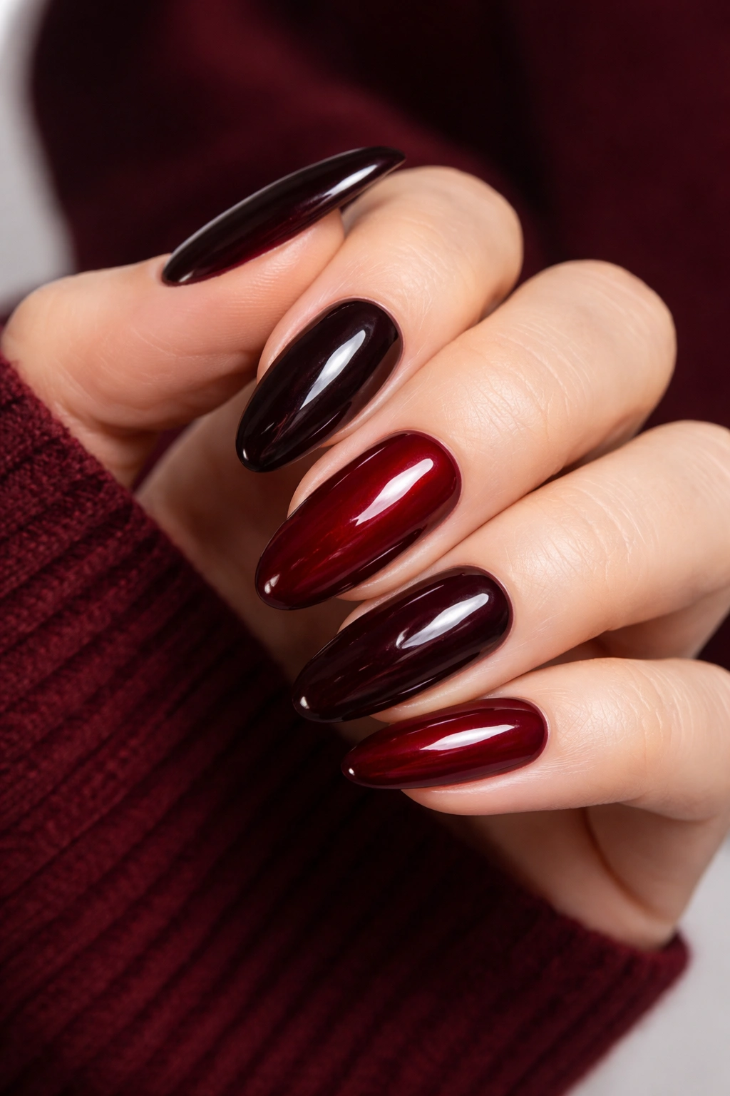 Nails in vampy burgundy wine red shades with high gloss