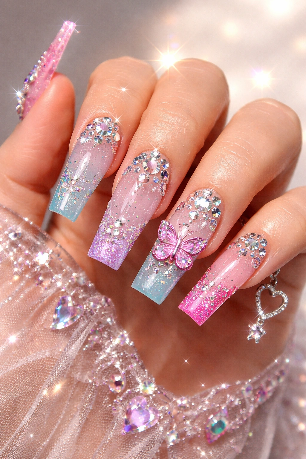 Close-up of Y2K nails with rhinestones and colorful tips